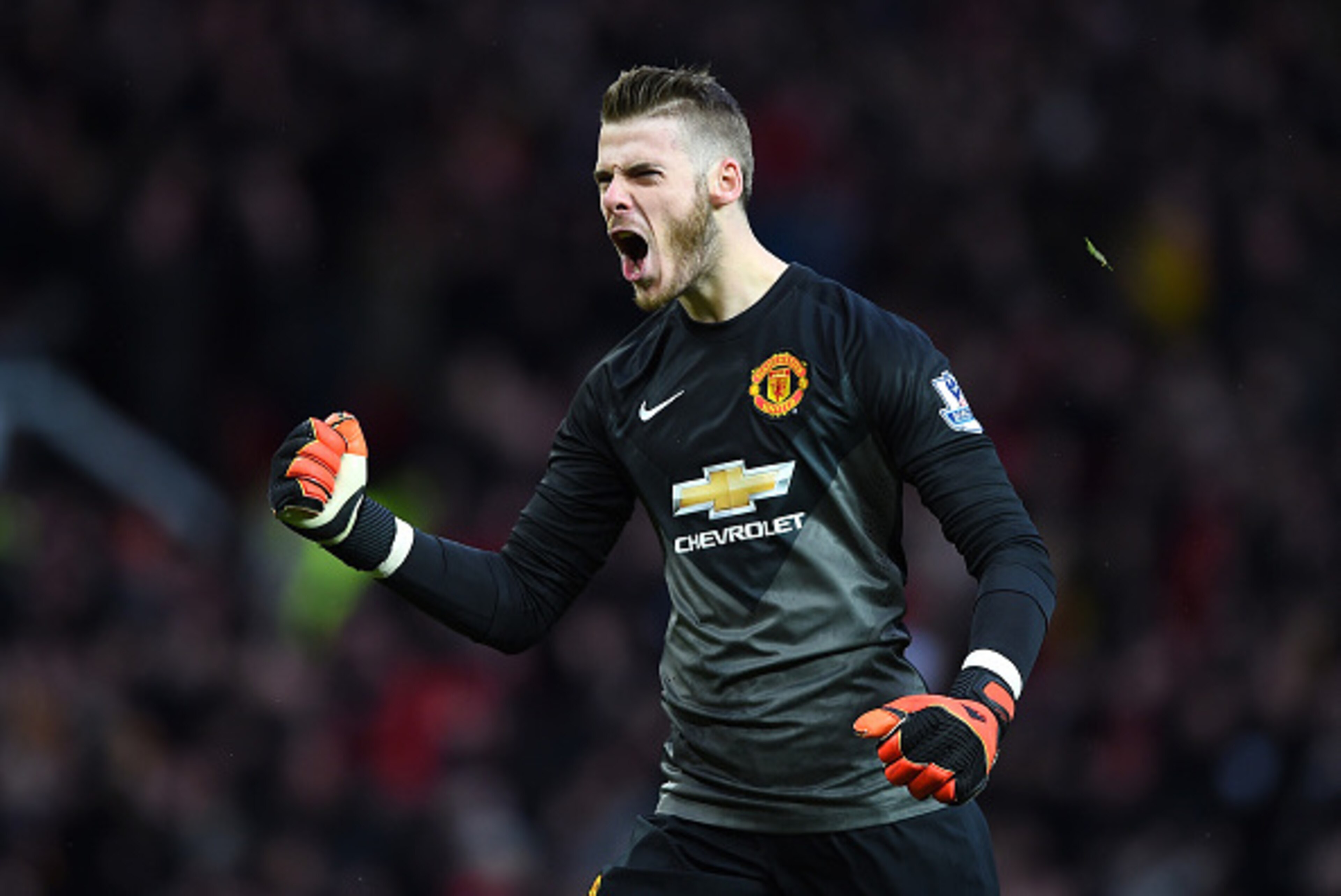 MANCHESTER, ENGLAND - DECEMBER 14:  David De Gea of Manchester United celebrates during the Barclays Premier League match between Manchester United and Liverpool at Old Trafford on December 14, 2014 in Manchester, England.  (Photo by Shaun Botterill/Getty