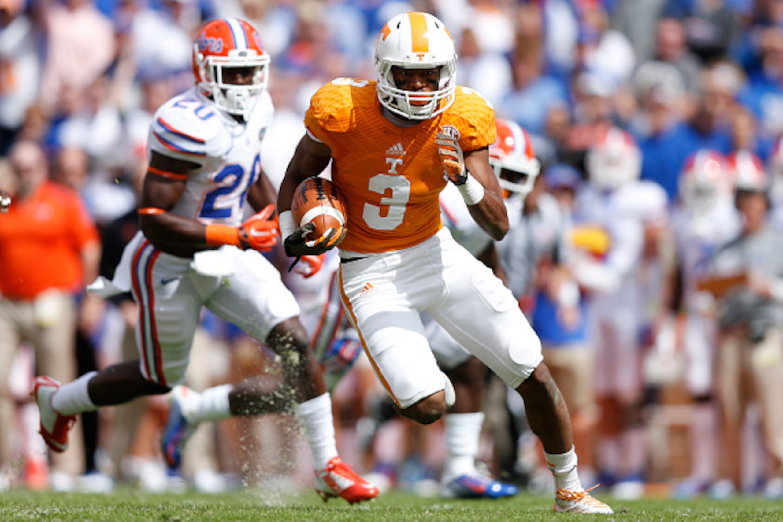 KNOXVILLE, TN - OCTOBER 4: Josh Malone #3 of the Tennessee Volunteers runs downfield after a reception during the first half of the game against the Florida Gators at Neyland Stadium on October 4, 2014 in Knoxville, Tennessee. (Photo by Joe Robbins/Getty 