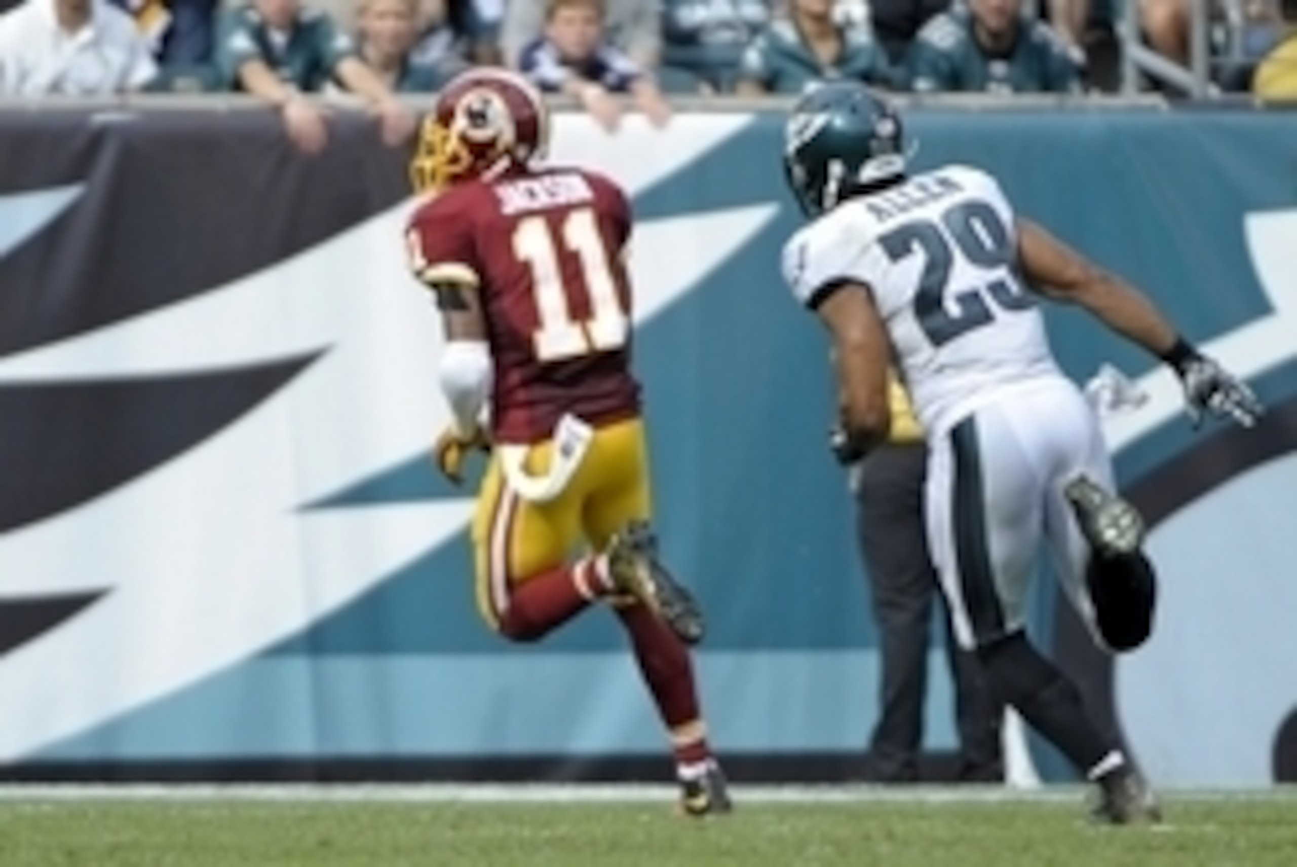 Sep 21, 2014; Philadelphia, PA, USA; Washington Redskins wide receiver DeSean Jackson (11) runs past Philadelphia Eagles strong safety Nate Allen (29) on an 81-yard touchdown catch in the third quarter at Lincoln Financial Field. The Eagles defeated the R