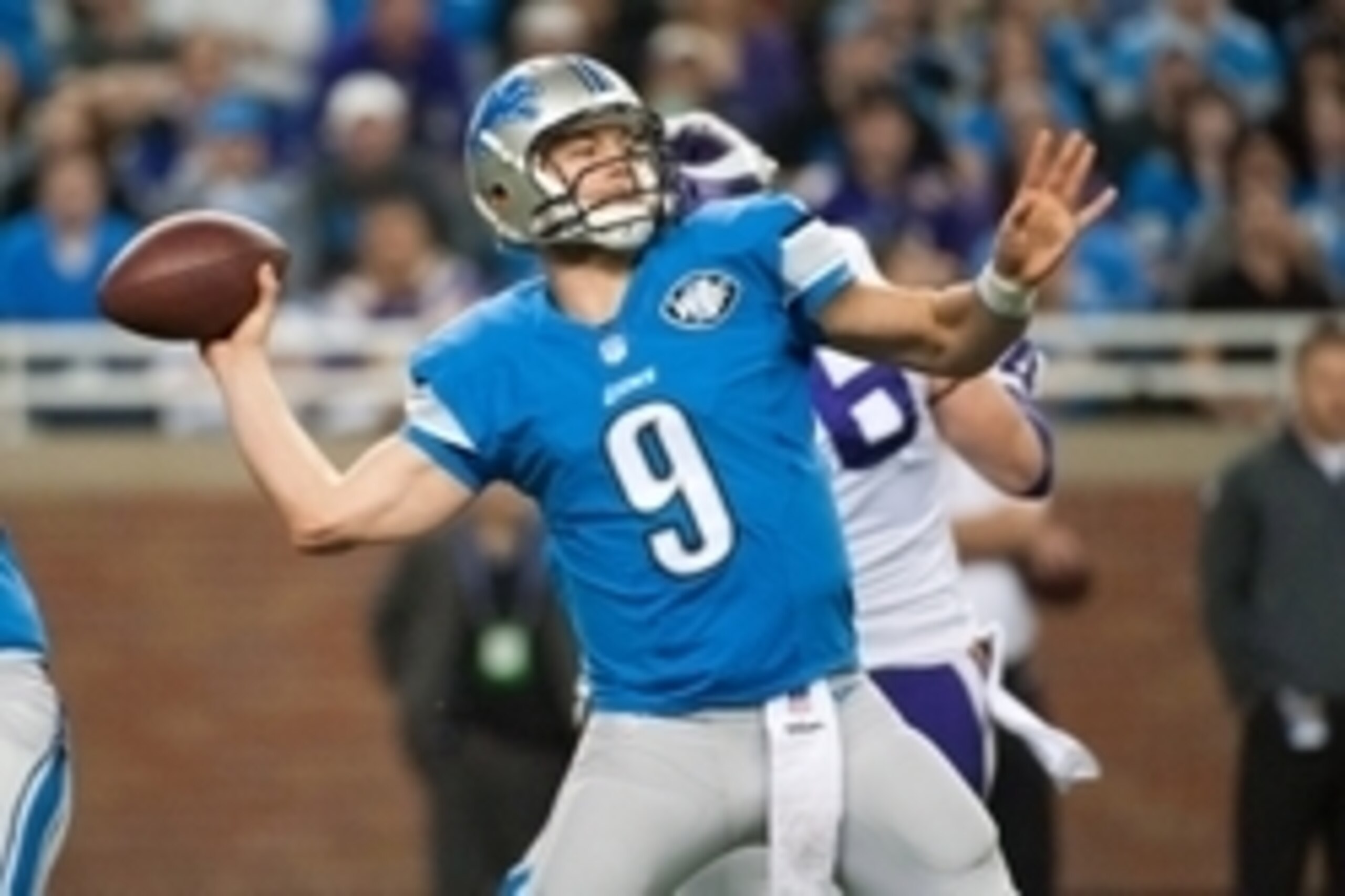 Dec 14, 2014; Detroit, MI, USA; Detroit Lions quarterback Matthew Stafford (9) drops back to pass during the first quarter against the Minnesota Vikings at Ford Field. Mandatory Credit: Tim Fuller-USA TODAY Sports