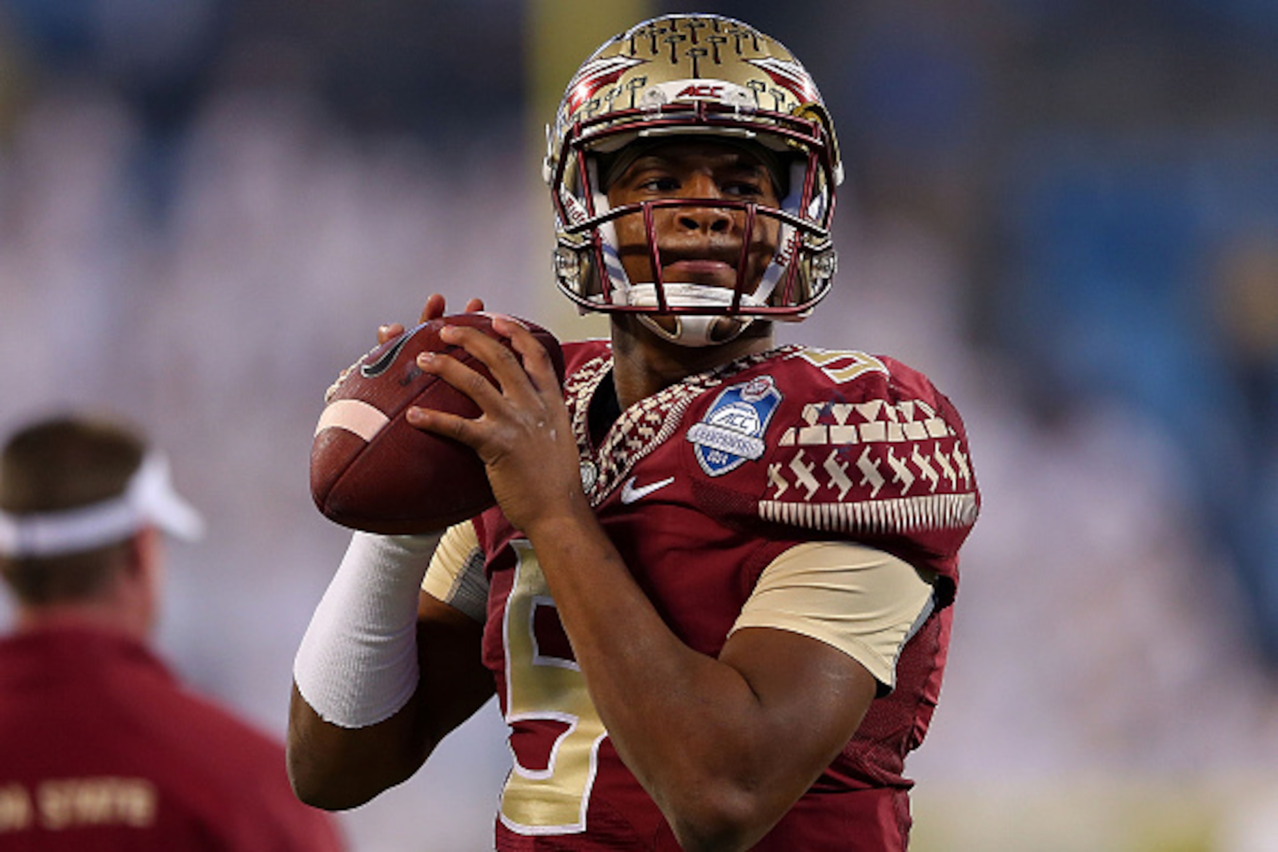 CHARLOTTE, NC - DECEMBER 06: Jameis Winston #5 of the Florida State Seminoles warms up before the game against the Georgia Tech Yellow Jackets at the ACC Championship game on December 6, 2014 in Charlotte, North Carolina. (Photo by Mike Ehrmann/Getty Imag