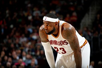 CLEVELAND, OH - DECEMBER 17: LeBron James #23 of the Cleveland Cavaliers stands on the court during a game against the Atlanta Hawks at The Quicken Loans Arena on December 17, 2014 in Cleveland, Ohio. NOTE TO USER: User expressly acknowledges and agrees t