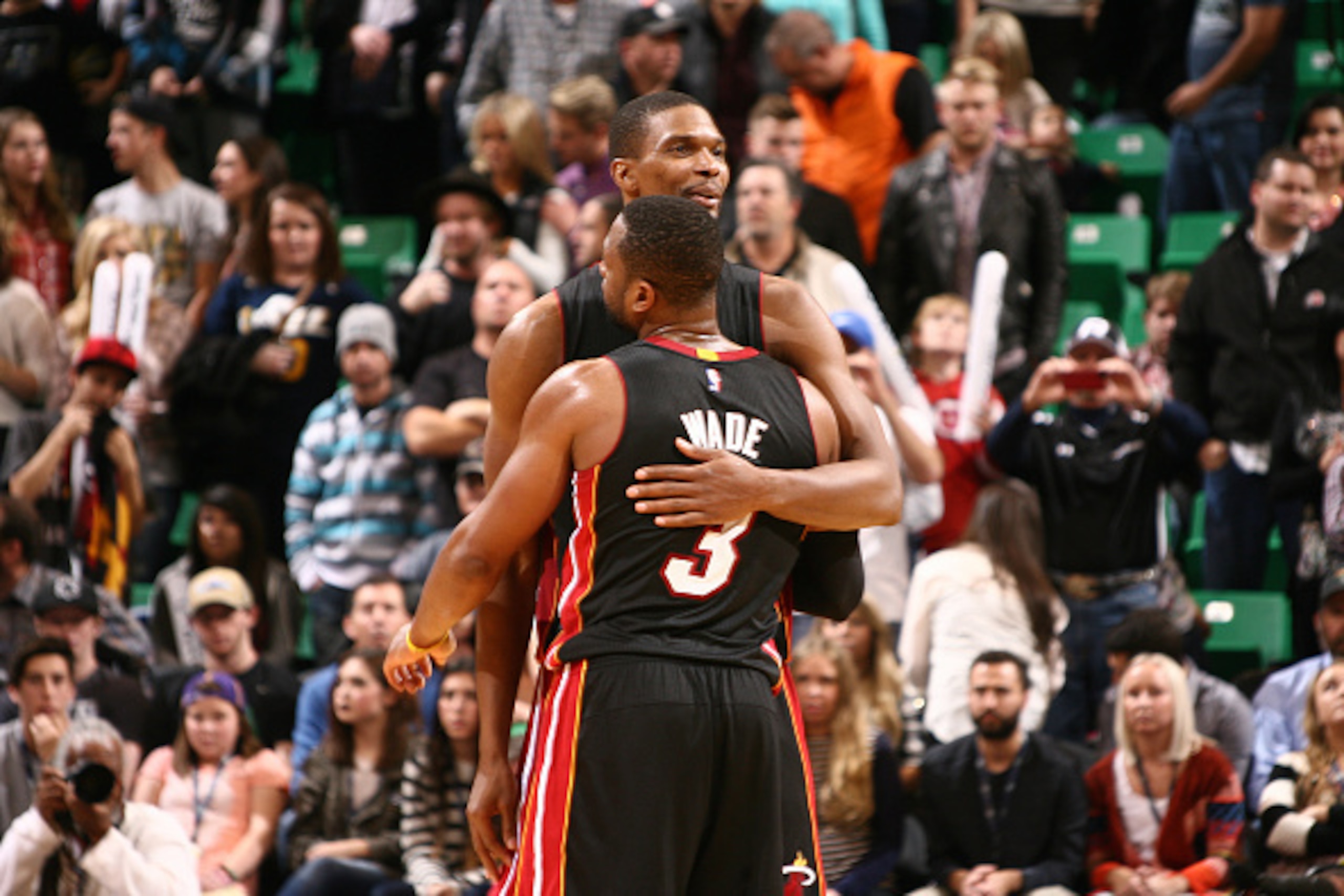 SALT LAKE CITY, UT - DECEMBER 12:  Chris Bosh #1 and Dwyane Wade #3 of the Miami Heat on the court after the win against the Utah Jazz at EnergySolutions Arena on December 12, 2014 in Salt Lake City, Utah. NOTE TO USER: User expressly acknowledges and agr