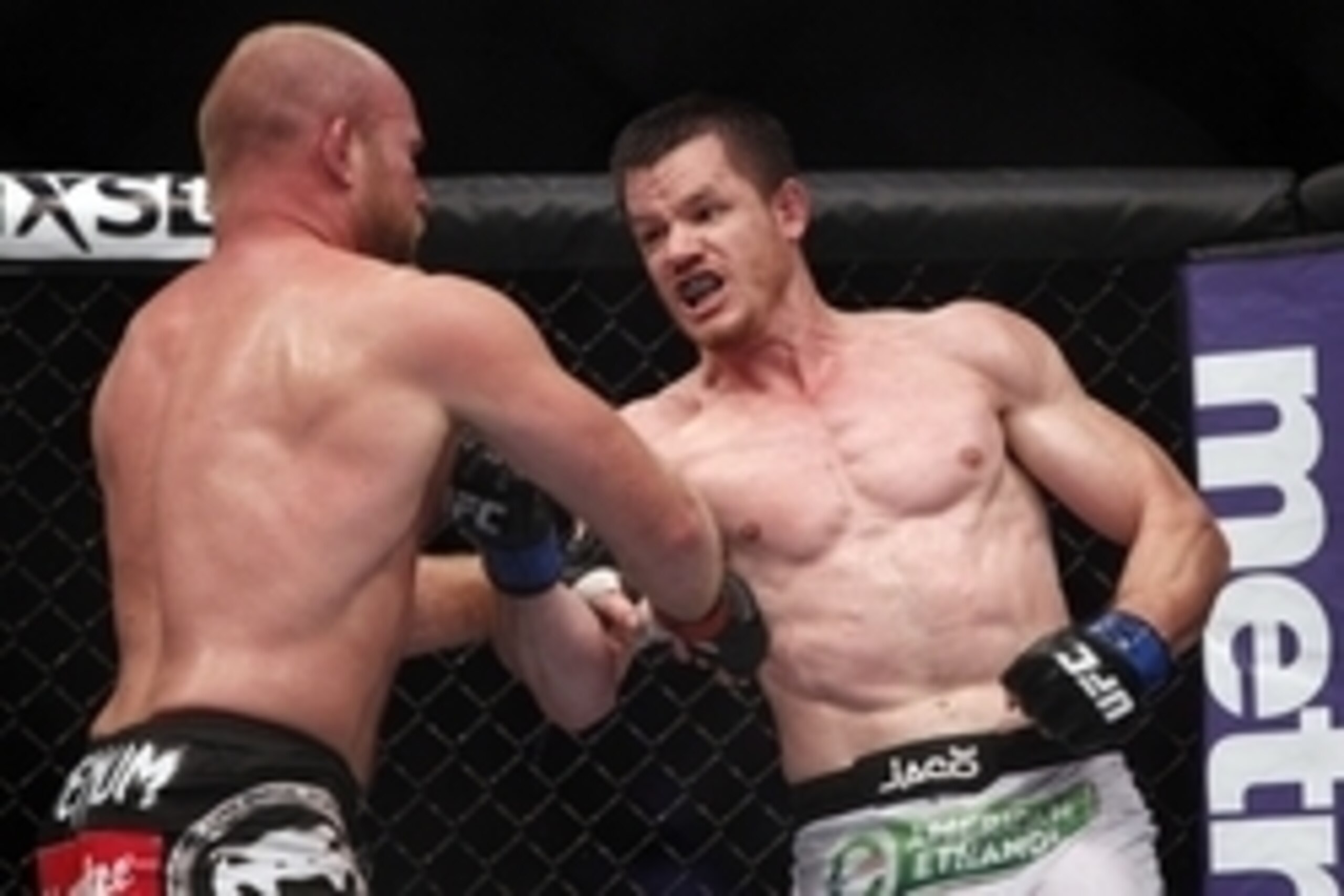Oct 19, 2013; Houston, TX, USA; Tim Boetsch (red gloves) fights against C.B. Dollaway (blue gloves) in their middleweight bout during UFC 166 at Toyota Center. Mandatory Credit: Andrew Richardson-USA TODAY Sports