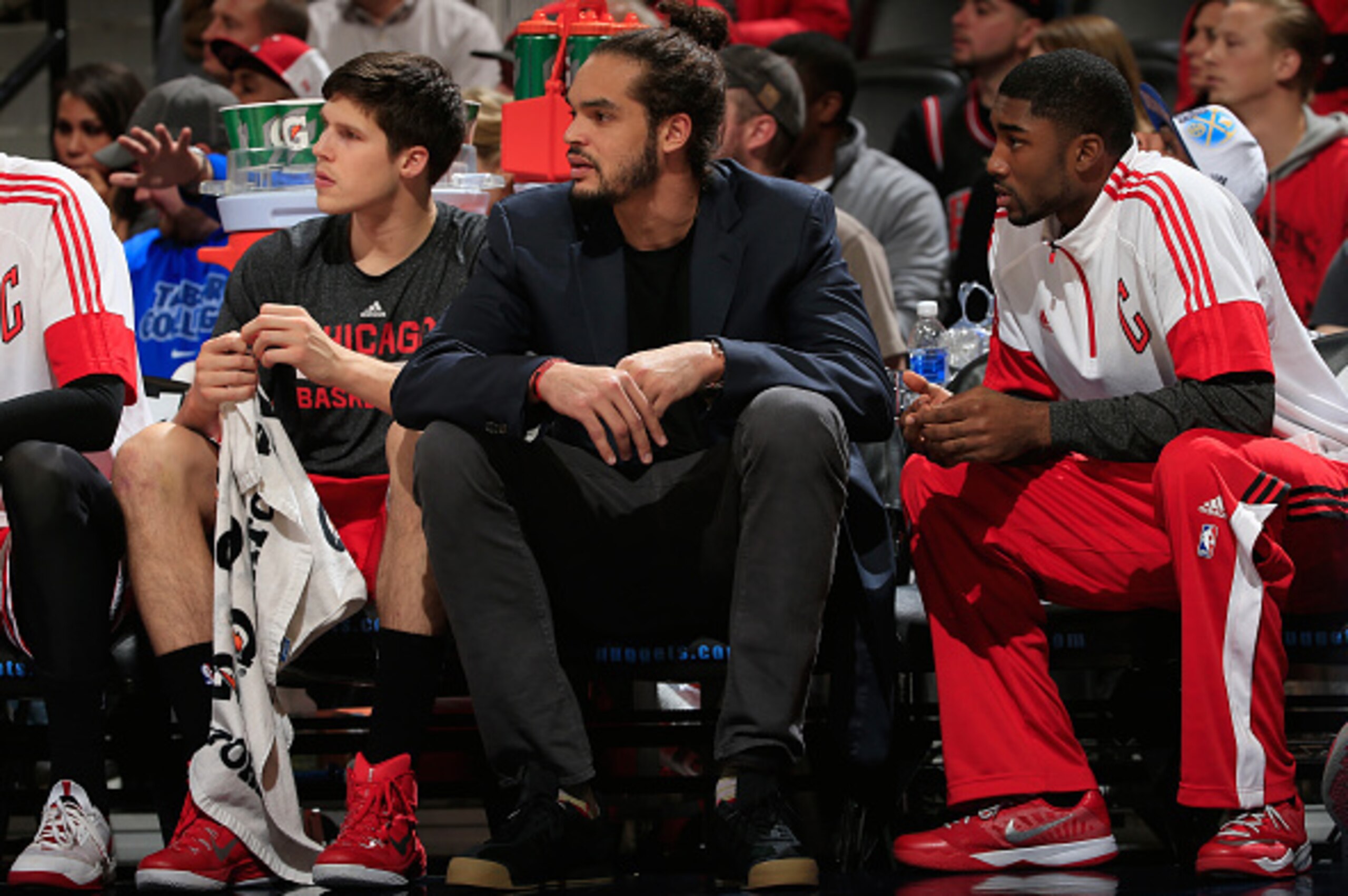 DENVER, CO - NOVEMBER 25:  Joakim Noah (C) of the Chicago Bulls watches from the bench as he sits out against the Denver Nuggets at Pepsi Center on November 25, 2014 in Denver, Colorado. The Nuggets defeated the Bulls 114-109. NOTE TO USER: User expressly