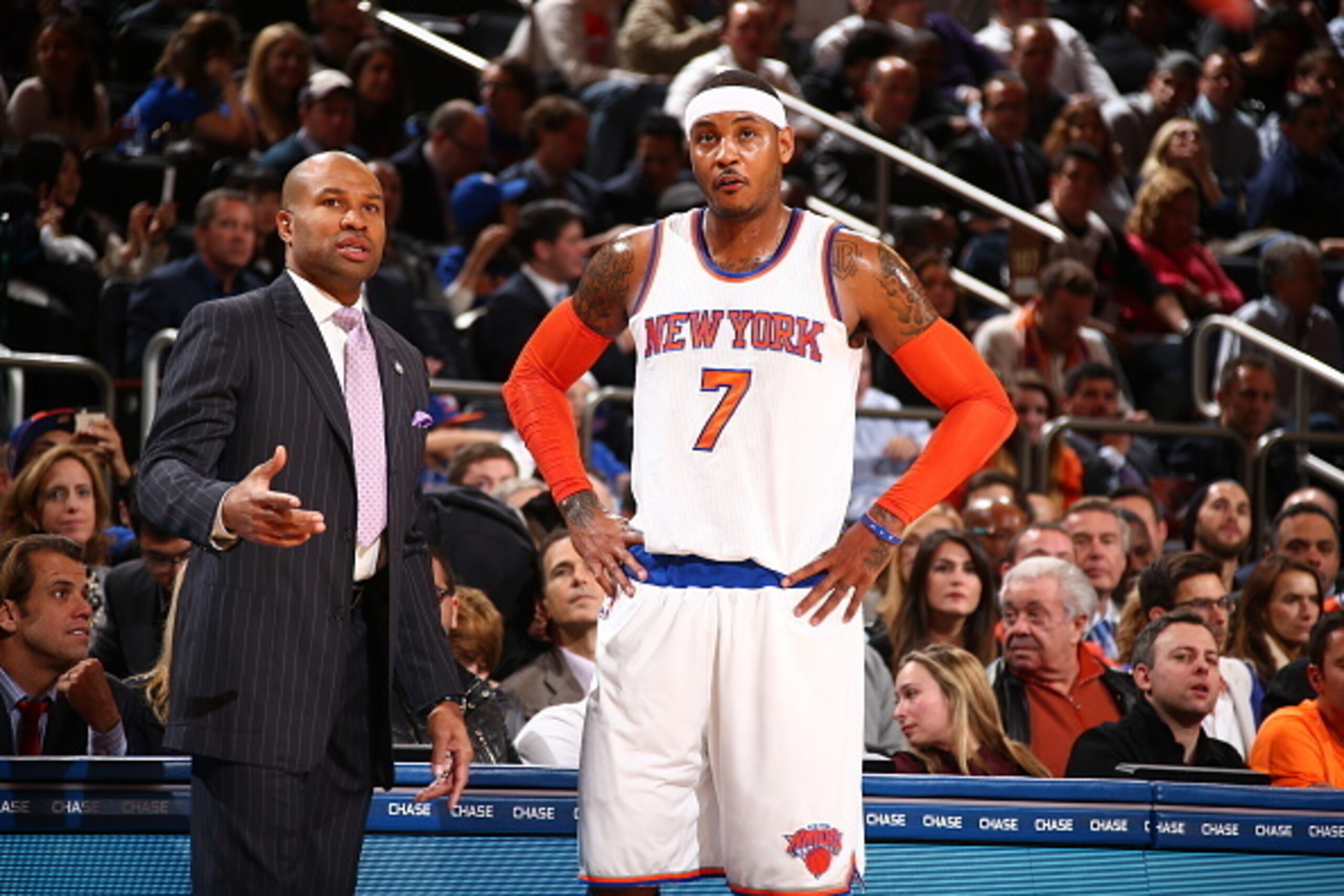 NEW YORK, NY - NOVEMBER 4:  Derek Fisher head coach speaks with Camelo Anthony #7 of the New York Knicks during the game against the Washington Wizards at Madison Square Garden in New York City, New York on November 4, 2014.  NOTE TO USER: User expressly 