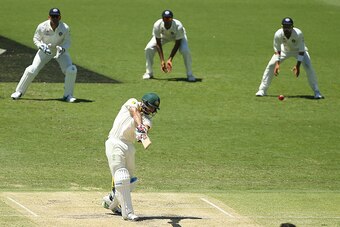 BRISBANE, AUSTRALIA - DECEMBER 19:  Mitchell Johnson of Australia bats during day three of the 2nd Test match between Australia and India at The Gabba on December 19, 2014 in Brisbane, Australia.  (Photo by Chris Hyde/Getty Images)