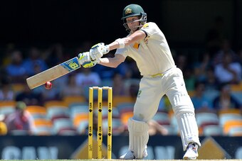 BRISBANE, AUSTRALIA - DECEMBER 19: Steve Smith of Australia plays a shot during day three of the 2nd Test match between Australia and India at The Gabba on December 19, 2014 in Brisbane, Australia.  (Photo by Bradley Kanaris/Getty Images)