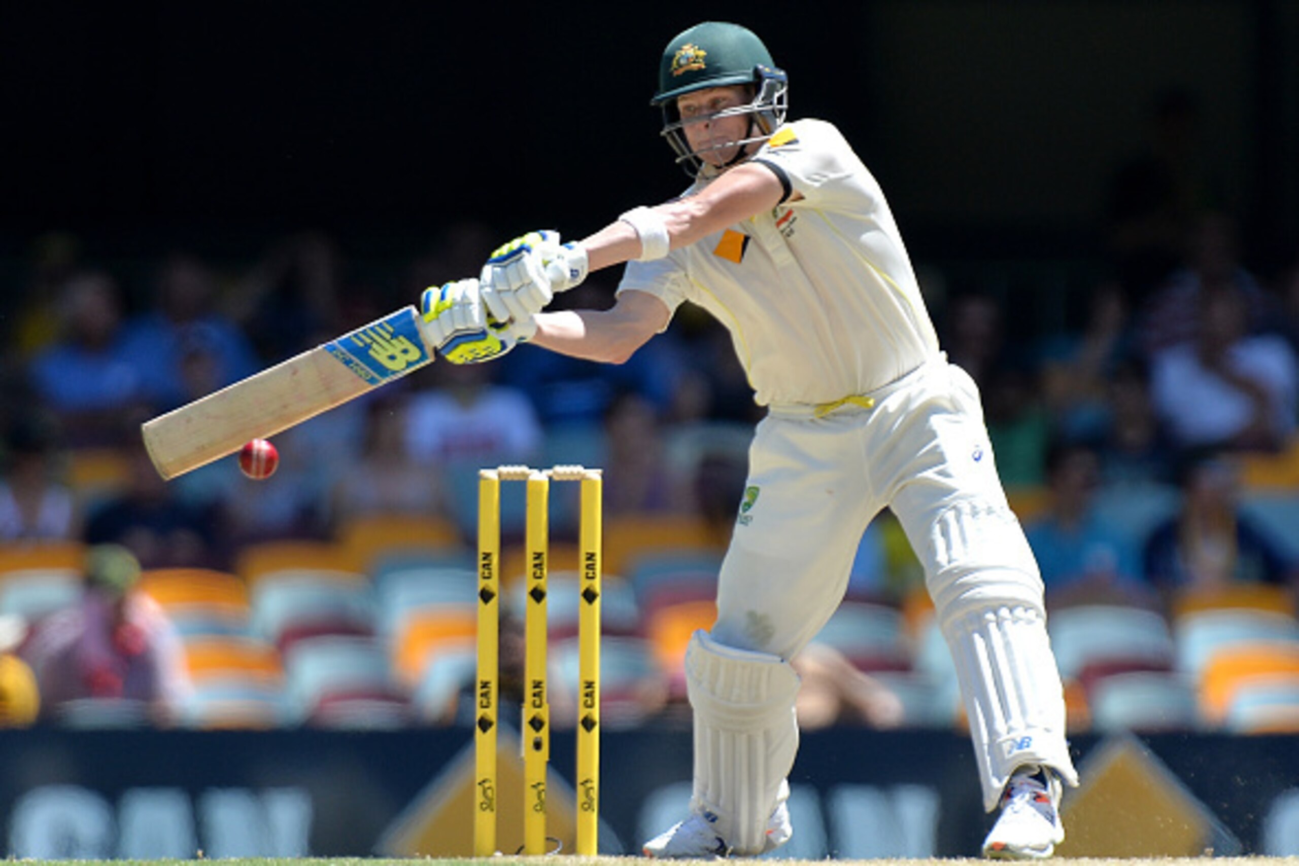 BRISBANE, AUSTRALIA - DECEMBER 19: Steve Smith of Australia plays a shot during day three of the 2nd Test match between Australia and India at The Gabba on December 19, 2014 in Brisbane, Australia.  (Photo by Bradley Kanaris/Getty Images)