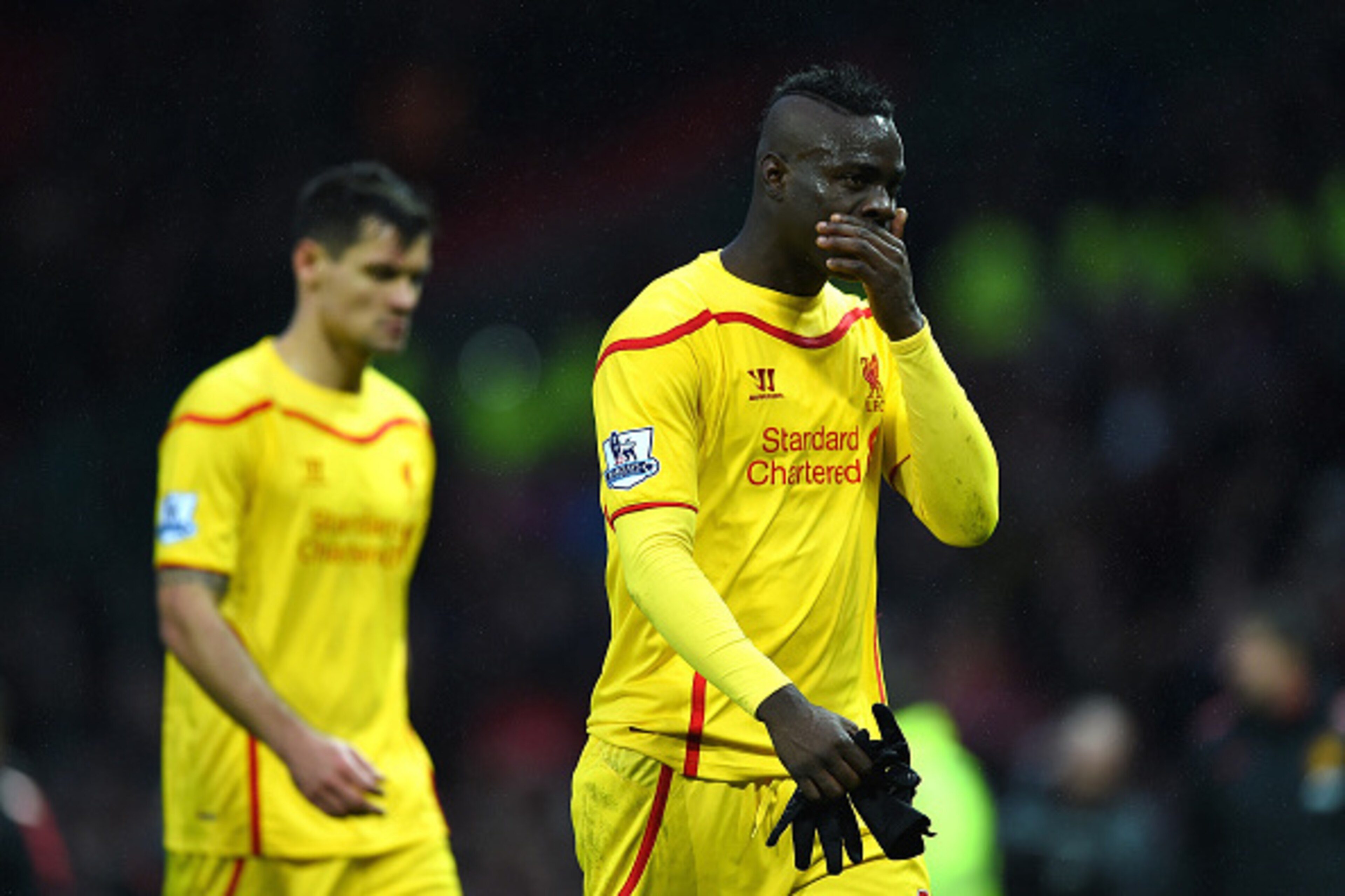 MANCHESTER, ENGLAND - DECEMBER 14:  Mario Balotelli of Liverpool shows his dejection at the end of the Barclays Premier League match between Manchester United and Liverpool at Old Trafford on December 14, 2014 in Manchester, England.  (Photo by Shaun Bott