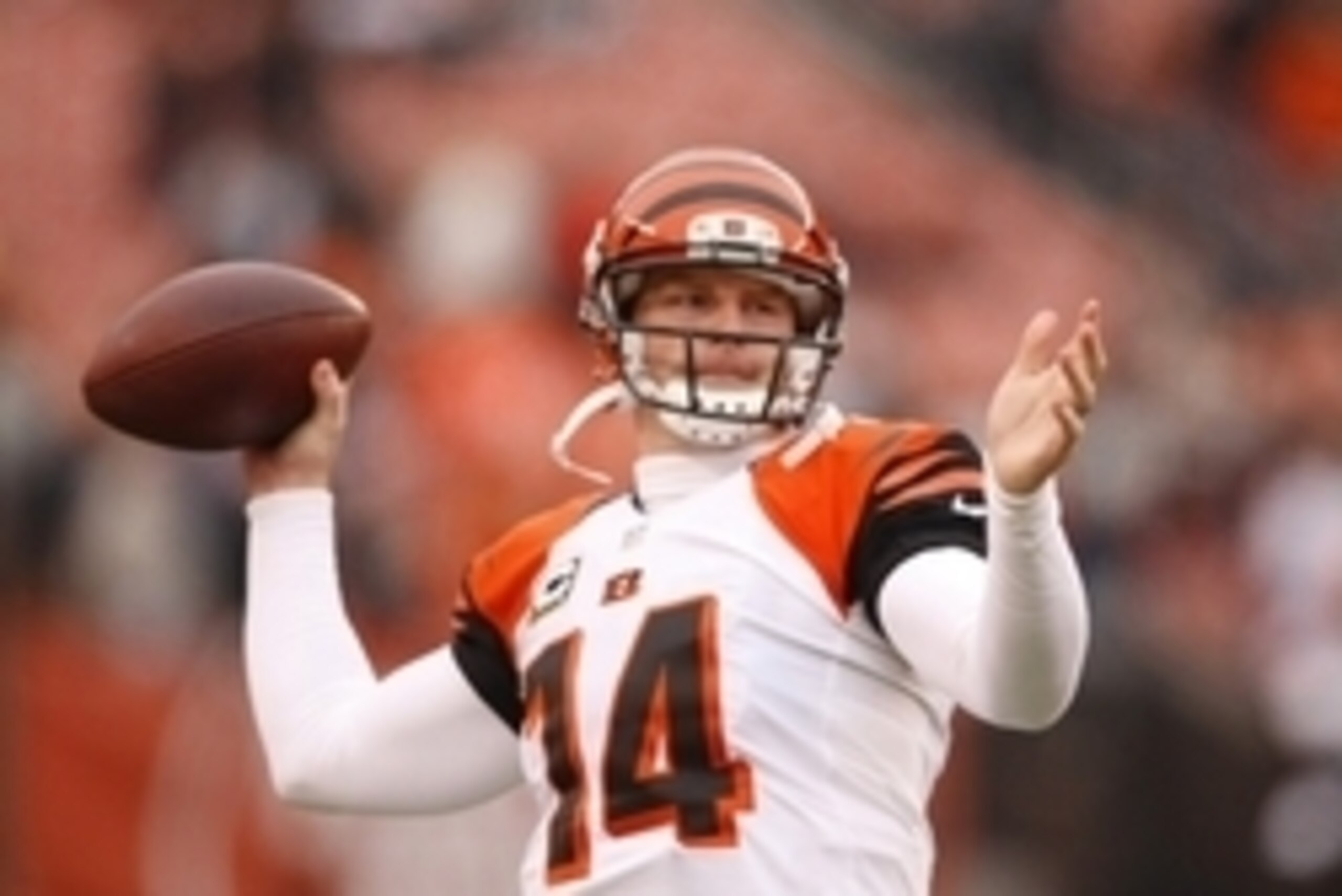 Dec 14, 2014; Cleveland, OH, USA; Cincinnati Bengals quarterback Andy Dalton (14) throws the ball prior to the game against the Cleveland Browns at FirstEnergy Stadium. Mandatory Credit: Joe Maiorana-USA TODAY Sports