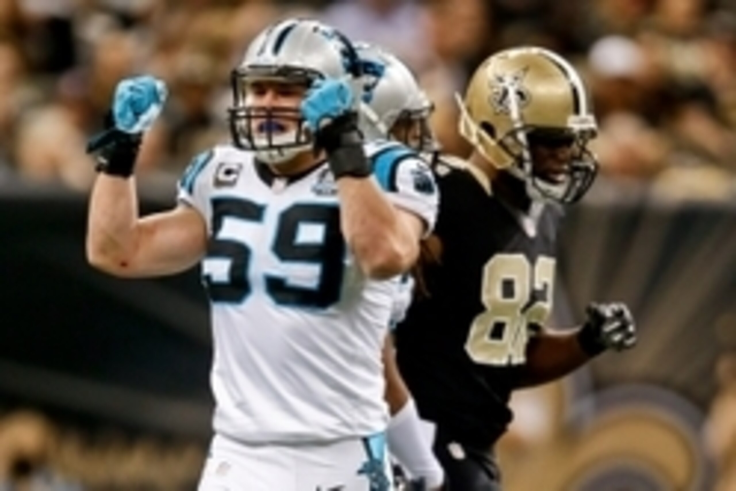 Dec 7, 2014; New Orleans, LA, USA; Carolina Panthers middle linebacker Luke Kuechly (59) reacts to a defensive stop against the New Orleans Saints during the third quarter of a game at the Mercedes-Benz Superdome. The Panthers defeated the Saints 41-10. M