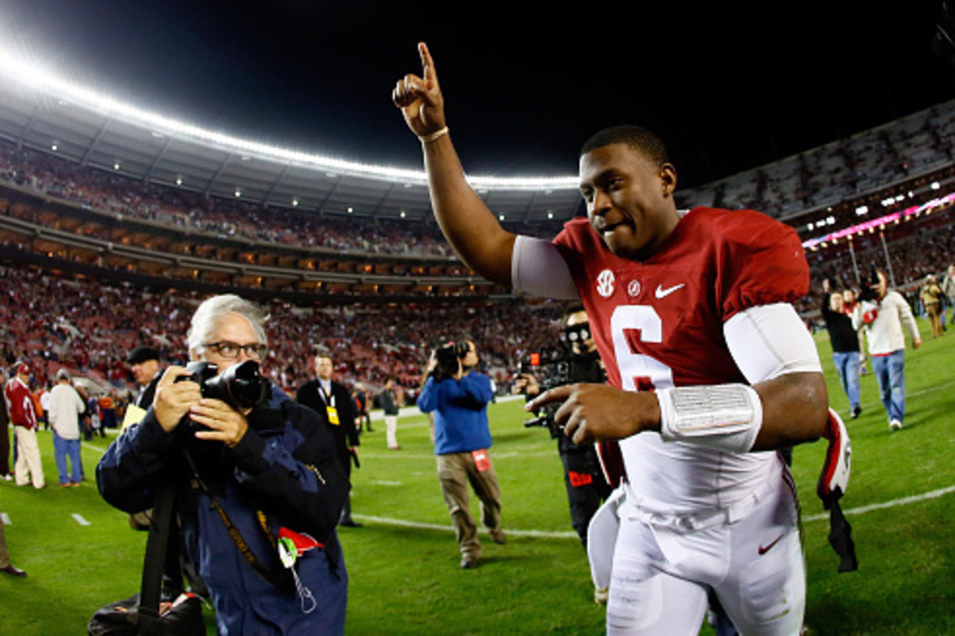 TUSCALOOSA, AL - NOVEMBER 29: Blake Sims #6 of the Alabama Crimson Tide celebrates as he runs off the field after defeating the Auburn Tigers in the Iron Bowl at Bryant-Denny Stadium on November 29, 2014 in Tuscaloosa, Alabama. The Alabama Crimson Tide d TUSCALOOSA, AL - NOVEMBER 29: Blake Sims #6 of the Alabama Crimson Tide celebrates as he runs off the field after defeating the Auburn Tigers in the Iron Bowl at Bryant-Denny Stadium on November 29, 2014 in Tuscaloosa, Alabama. The Alabama Crimson Tide d