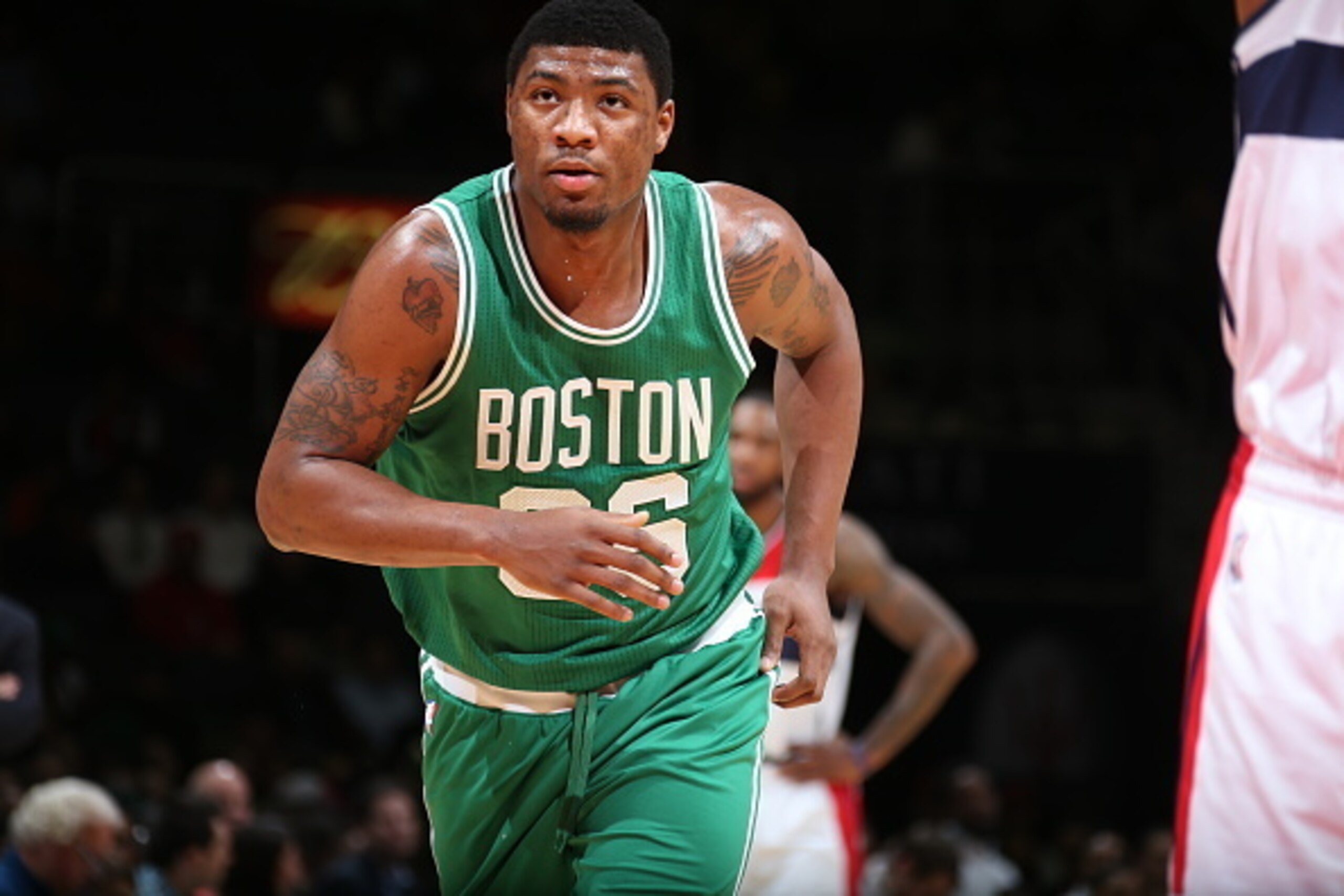 WASHINGTON, DC - DECEMBER 8:  Marcus Smart #36 of the Boston Celtics runs up court against the Washington Wizards on December 8, 2014 at the Verizon Center in Washington, DC. NOTE TO USER: User expressly acknowledges and agrees that, by downloading and or