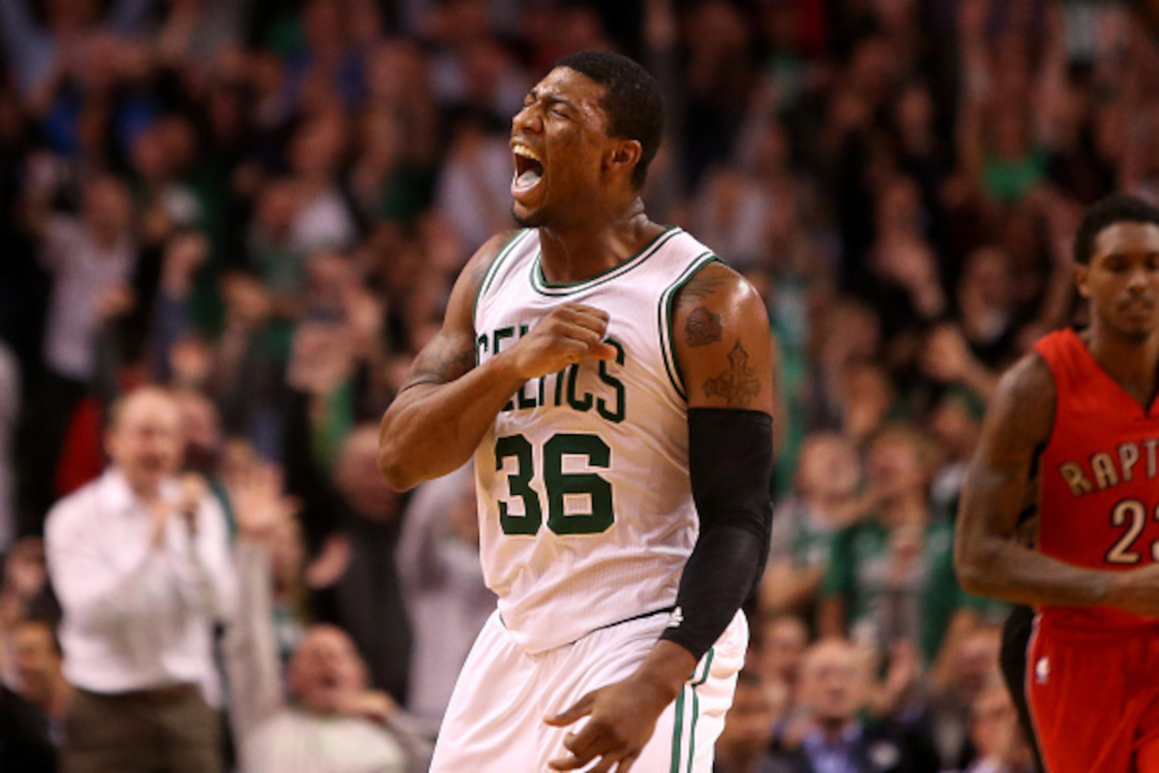 BOSTON, MA - NOVEMBER 05: Marcus Smart #36 of the Boston Celtics reacts after a three point basket late in the second half against the Toronto Raptors at TD Garden on November 5, 2014 in Boston, Massachusetts. NOTE TO USER: User expressly acknowledges and BOSTON, MA - NOVEMBER 05: Marcus Smart #36 of the Boston Celtics reacts after a three point basket late in the second half against the Toronto Raptors at TD Garden on November 5, 2014 in Boston, Massachusetts. NOTE TO USER: User expressly acknowledges and