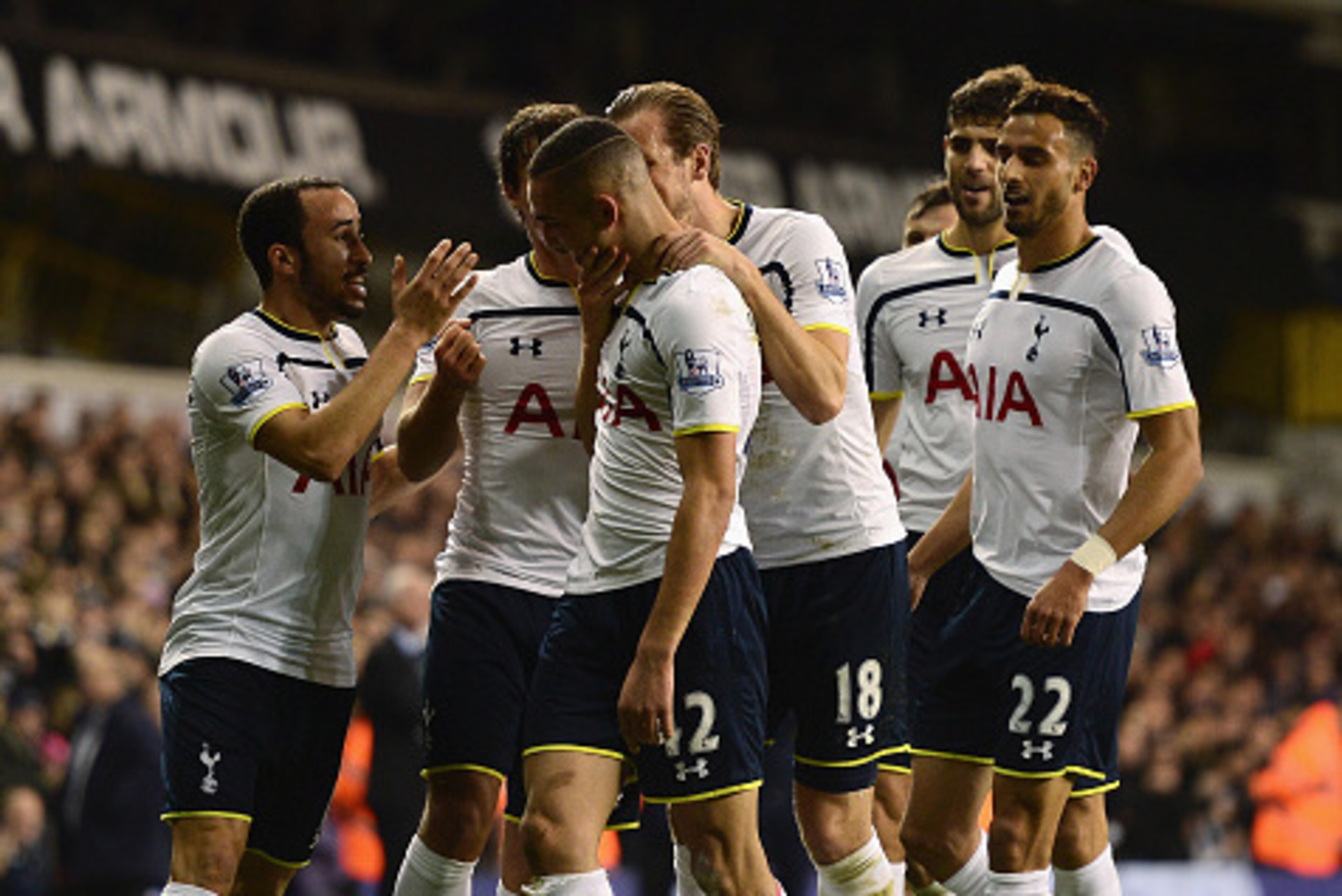 LONDON, ENGLAND - DECEMBER 17:  Nabil Bentaleb of Tottenham Hotspur celebrates scoring the opening goal with team mates during the Capital One Cup Quarter-Final match between Tottenham Hotspur and Newcastle United at White Hart Lane on December 17, 2014 i
