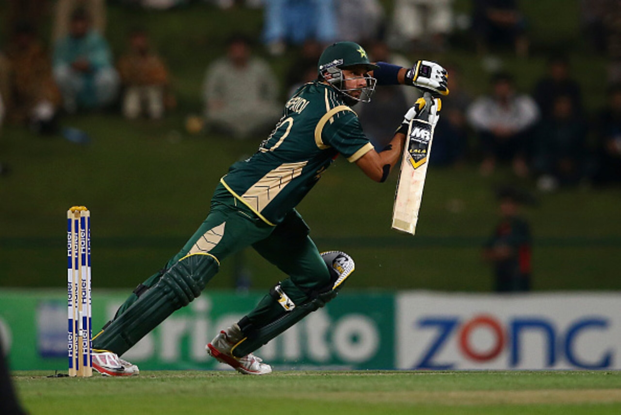 ABU DHABI, UNITED ARAB EMIRATES - DECEMBER 17: Shahid Afridi of Pakistan bats during the 4th One Day International match between Pakistan and New Zealand at Sheikh Zayed Stadium on December 17, 2014 in Abu Dhabi, United Arab Emirates.  (Photo by Francois 