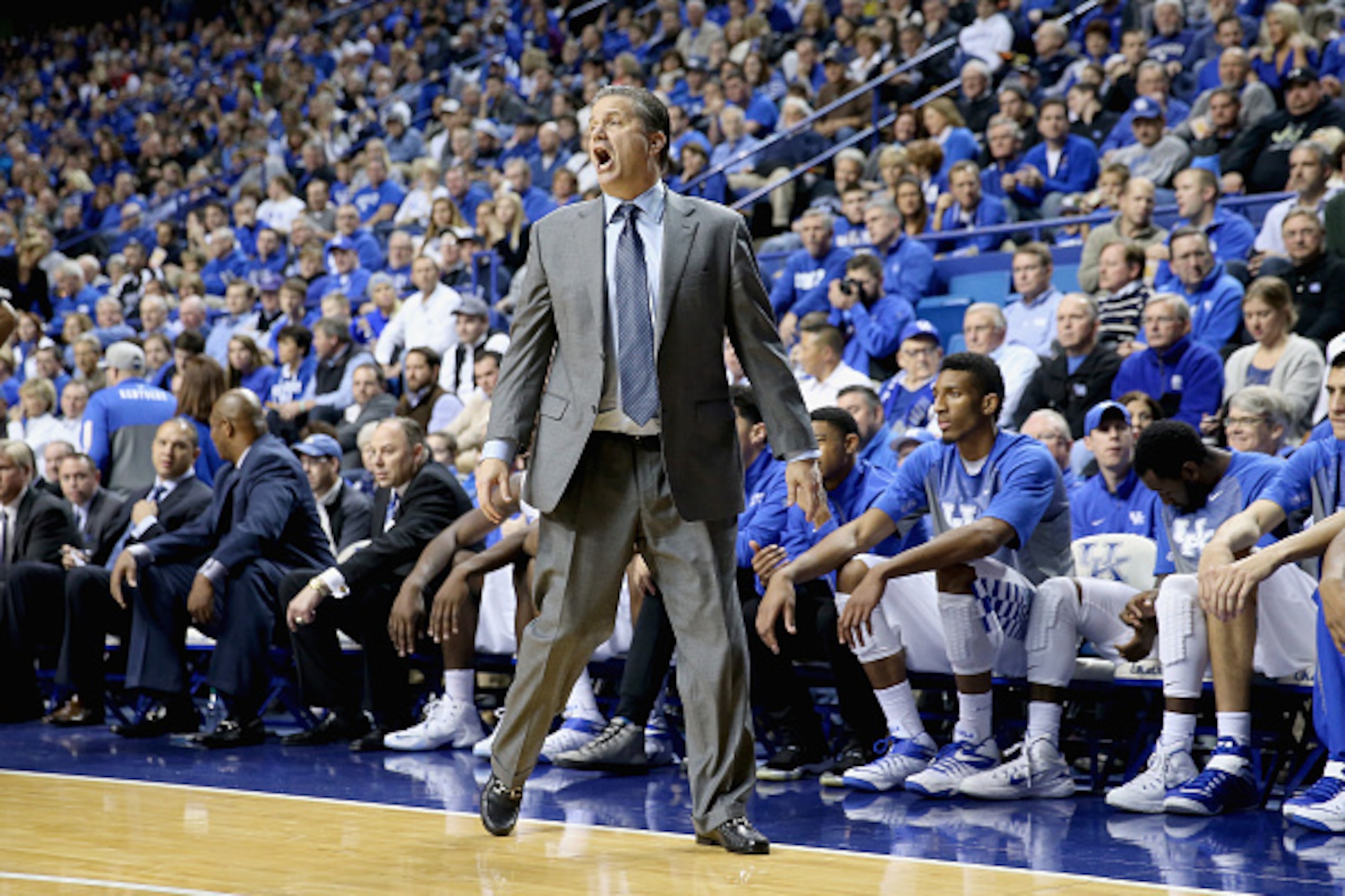 LEXINGTON, KY - DECEMBER 10:  John Calipari the head coach of the Kentucky Wildcats gives instructions to his team during the game against the Columbia Lions at Rupp Arena on December 10, 2014 in Lexington, Kentucky.  (Photo by Andy Lyons/Getty Images)