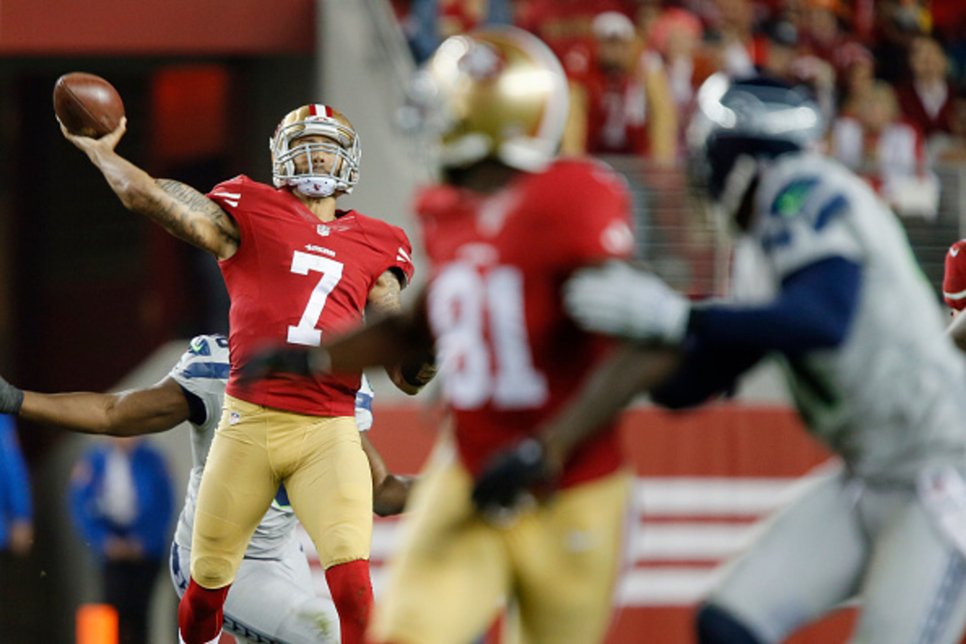 SANTA CLARA, CA - NOVEMBER 27:  Quarterback Colin Kaepernick #7 launches the ball to wide receiver Anquan Boldin #81 of the San Francisco 49ers against the Seattle Seahawks in the second quarter on November 27, 2014 at Levi's Stadium in Santa Clara, Calif