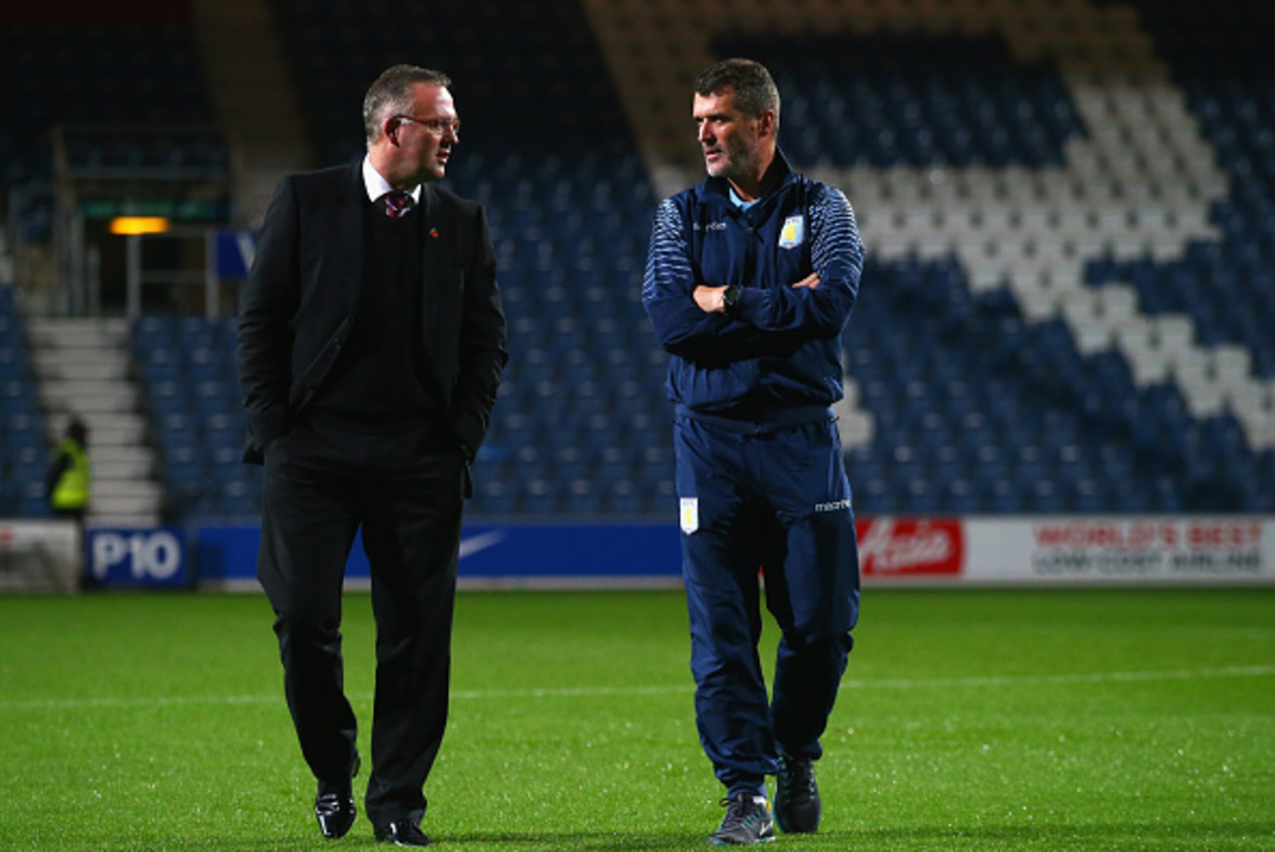 LONDON, ENGLAND - OCTOBER 27: Manager Paul Lambert of Aston Villa and Roy Keane, Aston Villa assistant manager walk on the pitch prior to the Barclays Premier League match between Queens Park Rangers and Aston Villa at Loftus Road on October 27, 2014 in LONDON, ENGLAND - OCTOBER 27: Manager Paul Lambert of Aston Villa and Roy Keane, Aston Villa assistant manager walk on the pitch prior to the Barclays Premier League match between Queens Park Rangers and Aston Villa at Loftus Road on October 27, 2014 in