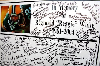CHARLOTTE, NC - DECEMBER 29:  A poster signed by family and friends sits on display at a memorial service for former NFL great Reggie White at A.L. Jinwright Funeral Service on December 29, 2004 in Charlotte, North Carolina. White died in his sleep Decemb