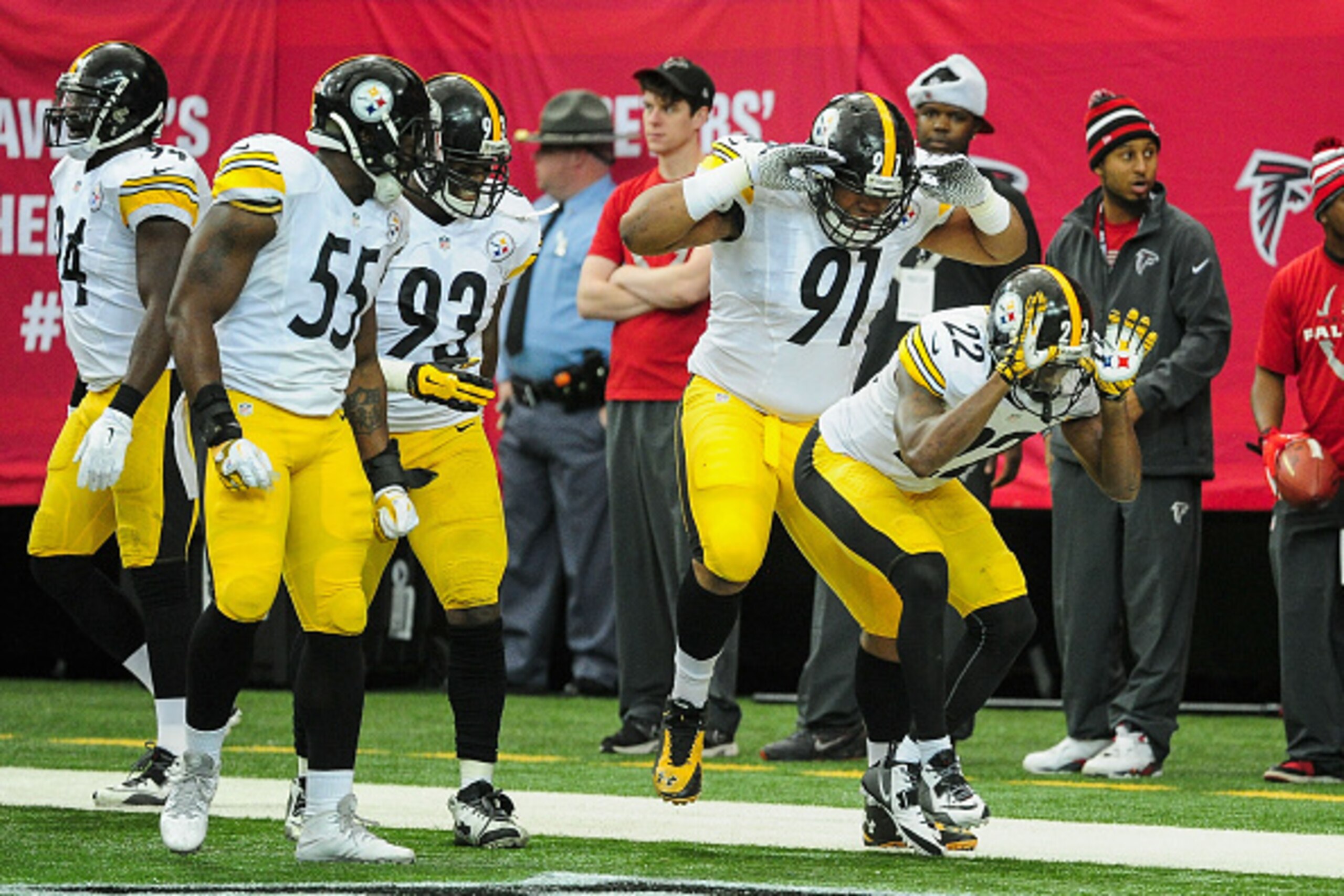 ATLANTA, GA - DECEMBER 14: William Gay #22 of the Pittsburgh Steelers celebrates an interception and touchdown with Stephon Tuitt #91 in the first half against the Atlanta Falcons at the Georgia Dome on December 14, 2014 in Atlanta, Georgia.  (Photo by Sc