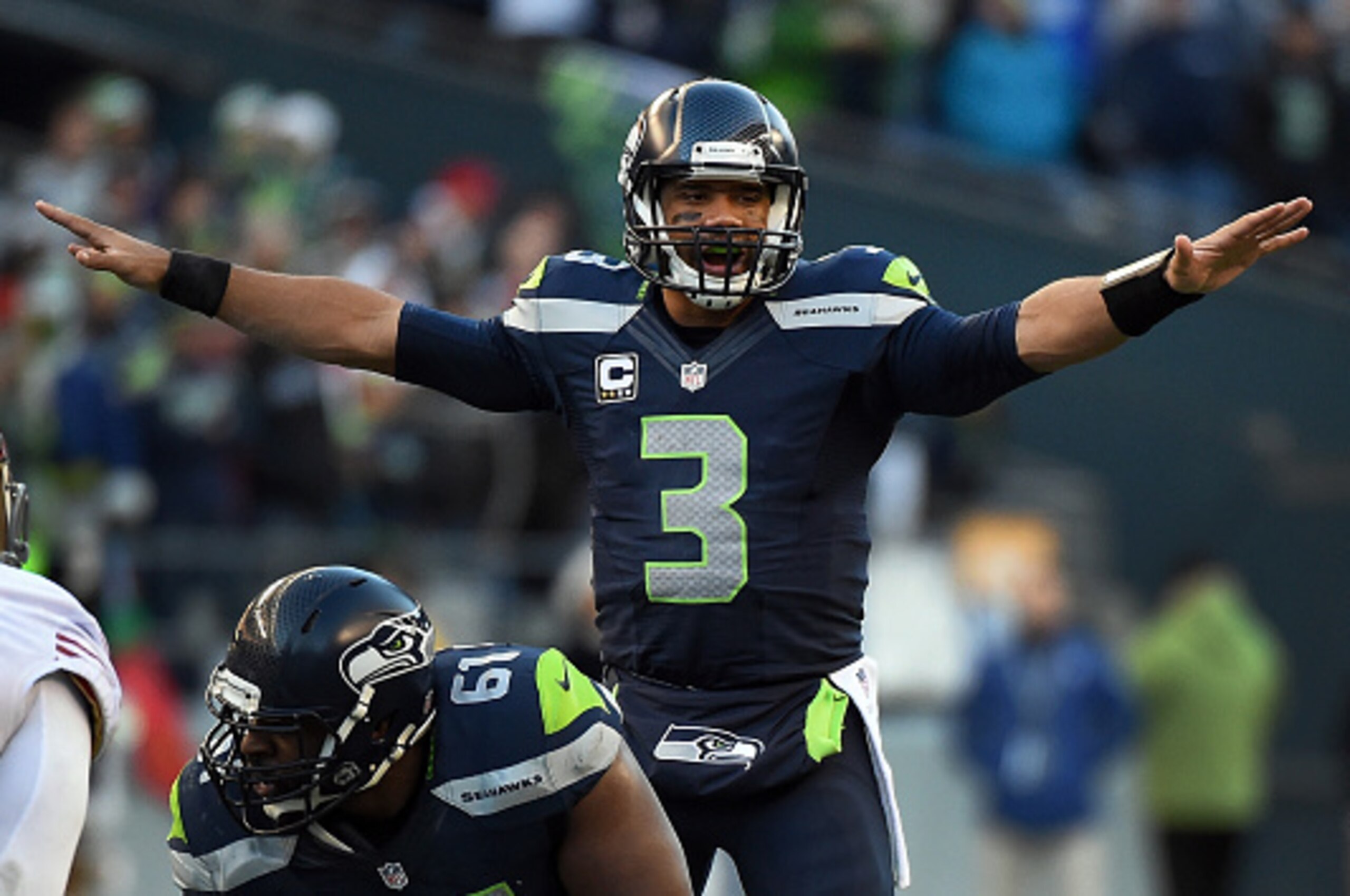 SEATTLE, WA - DECEMBER 14: Quarterback Russell Wilson #3 of the Seattle Seahawks calls out a play during the third quarter of the game against the San Francisco 49ers at CenturyLink Field on December 14, 2014 in Seattle, Washington. (Photo by Steve Dykes/ SEATTLE, WA - DECEMBER 14: Quarterback Russell Wilson #3 of the Seattle Seahawks calls out a play during the third quarter of the game against the San Francisco 49ers at CenturyLink Field on December 14, 2014 in Seattle, Washington. (Photo by Steve Dykes/