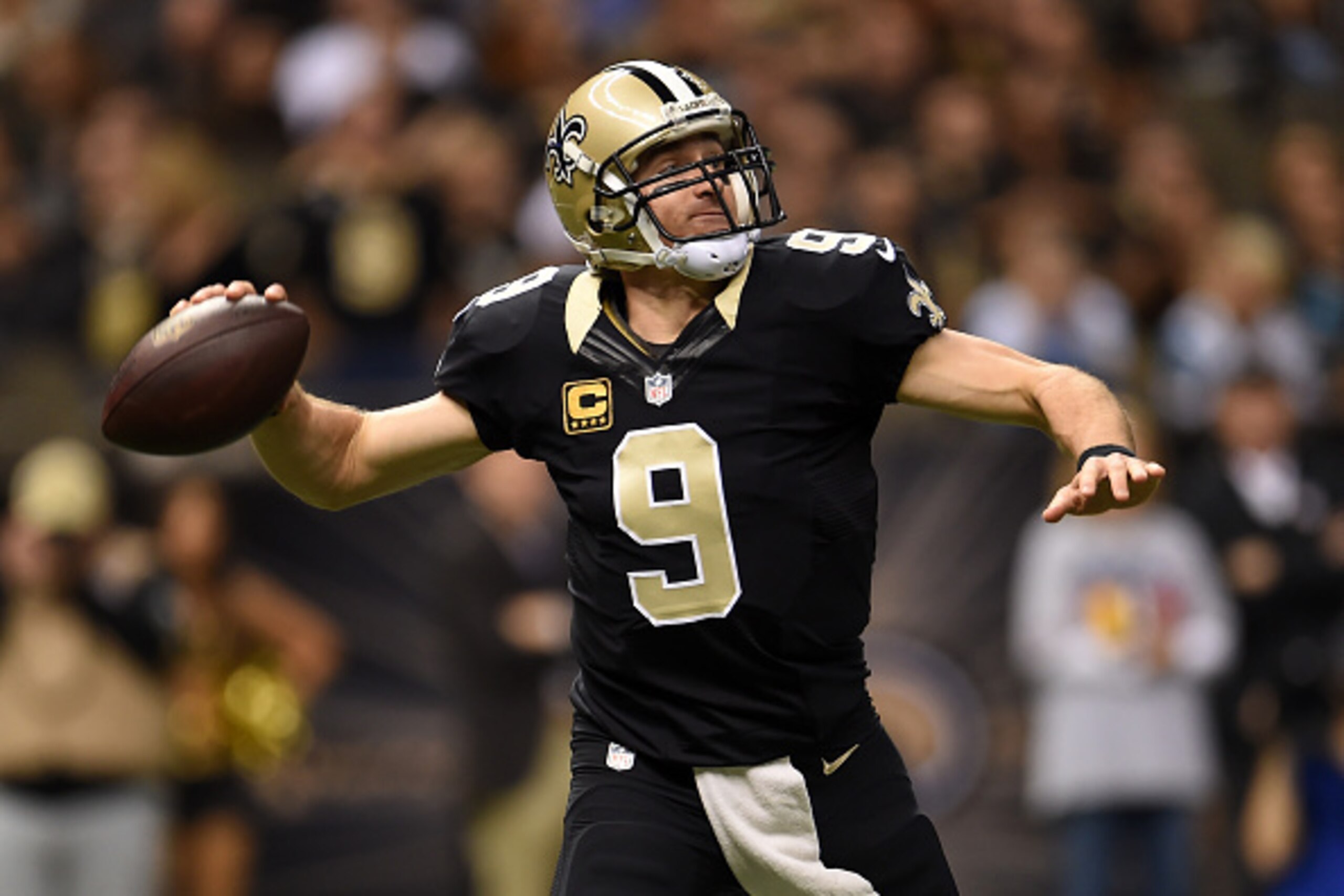 NEW ORLEANS, LA - DECEMBER 07: Drew Brees #9 of the New Orleans Saints throws a pass during the first quarter against the Carolina Panthers at Mercedes-Benz Superdome on December 7, 2014 in New Orleans, Louisiana. (Photo by Stacy Revere/Getty Images) NEW ORLEANS, LA - DECEMBER 07: Drew Brees #9 of the New Orleans Saints throws a pass during the first quarter against the Carolina Panthers at Mercedes-Benz Superdome on December 7, 2014 in New Orleans, Louisiana. (Photo by Stacy Revere/Getty Images)