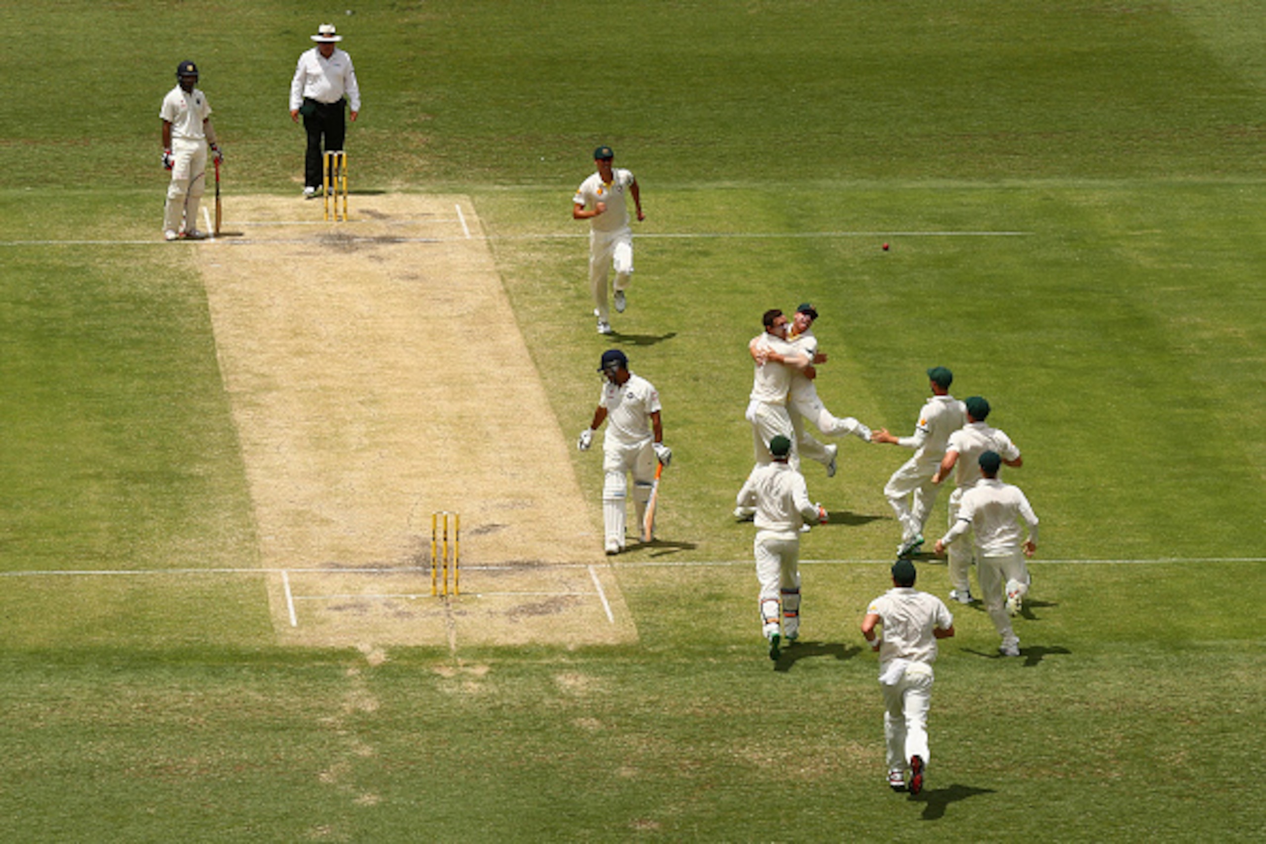 BRISBANE, AUSTRALIA - DECEMBER 20: Josh Hazlewood of Australia celebrates dismissing MS Dhoni of India for LBW during day four of the 2nd Test match between Australia and India at The Gabba on December 20, 2014 in Brisbane, Australia. (Photo by Cameron BRISBANE, AUSTRALIA - DECEMBER 20: Josh Hazlewood of Australia celebrates dismissing MS Dhoni of India for LBW during day four of the 2nd Test match between Australia and India at The Gabba on December 20, 2014 in Brisbane, Australia. (Photo by Cameron