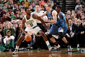 BOSTON, MA - DECEMBER 19: Jeff Green #8 of the Boston Celtics handles the ball against Robbie Hummel #4 of the Minnesota Timberwolves on December 19, 2014 at the TD Garden in Boston, Massachusetts. NOTE TO USER: User expressly acknowledges and agrees that