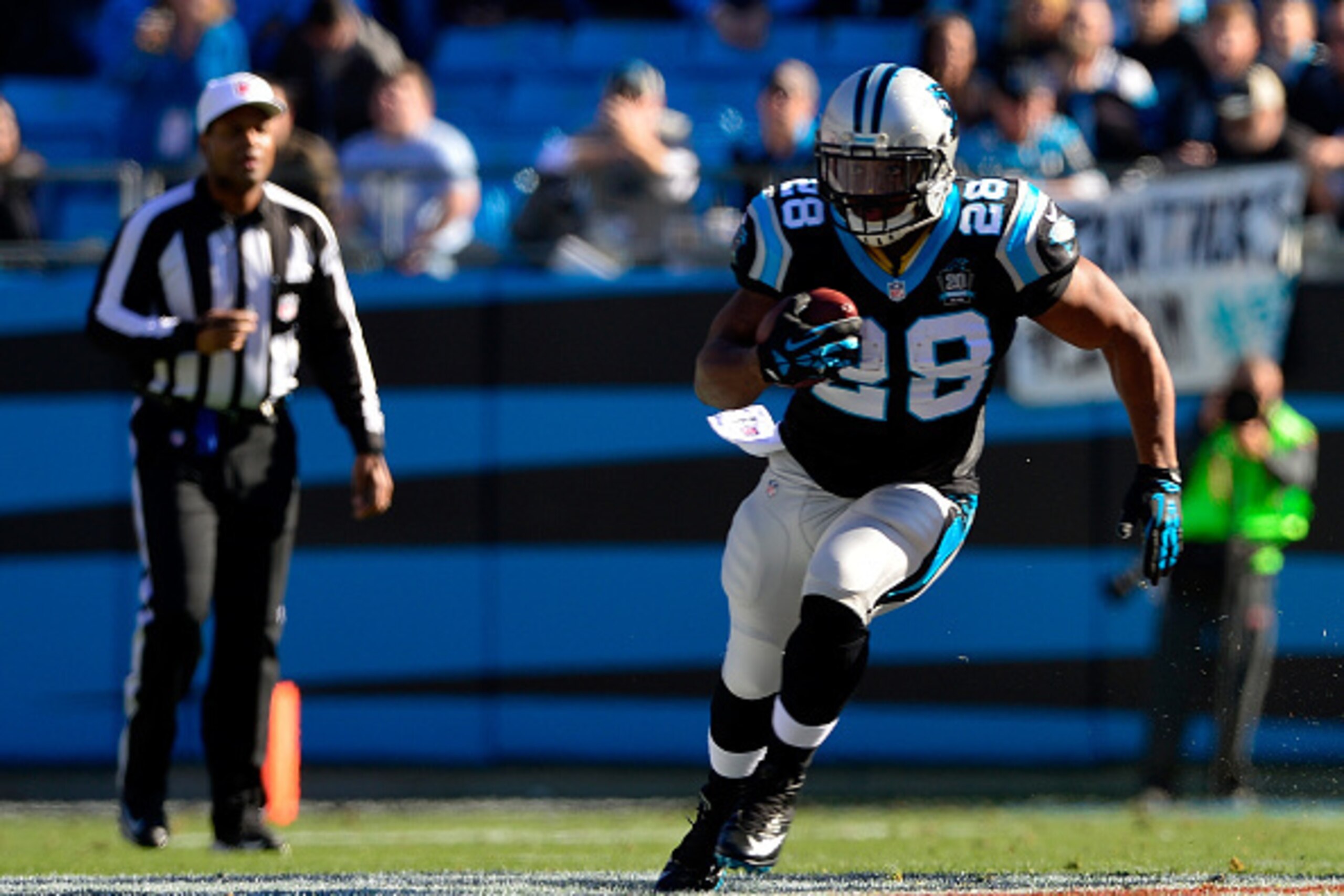 CHARLOTTE, NC - DECEMBER 14:  Jonathan Stewart #28 of the Carolina Panthers runs the ball against the Tampa Bay Buccaneers in the 1st quarter during their game at Bank of America Stadium on December 14, 2014 in Charlotte, North Carolina.  (Photo by Grant 
