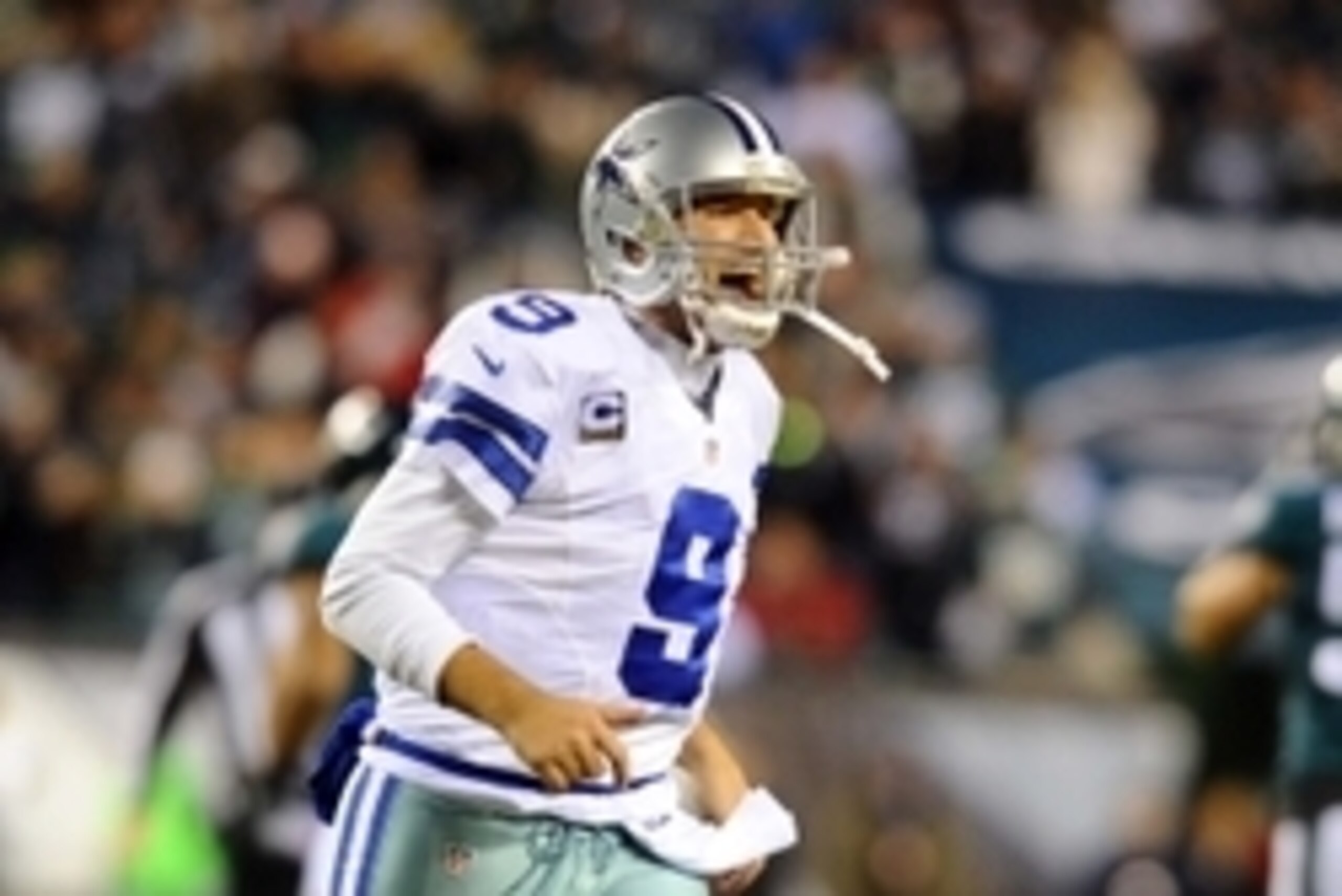 Dec 14, 2014; Philadelphia, PA, USA; Dallas Cowboys quarterback Tony Romo reacts to the referee in the fourth quarter against the Philadelphia Eagles at Lincoln Financial Field. Dallas defeated Philadelphia 38-27.  Mandatory Credit: James Lang-USA TODAY S