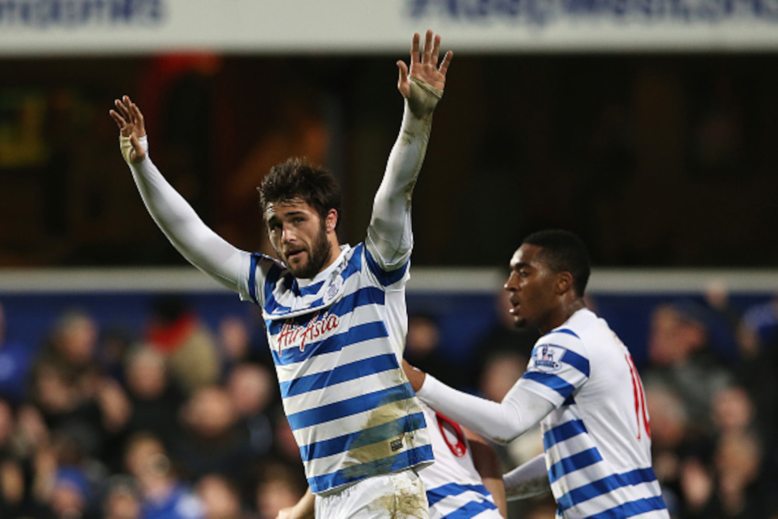 LONDON, ENGLAND - DECEMBER 20: Charlie Austin of QPR celebrates his third goal during the Barclays Premier League match between Queens Park Rangers and West Bromwich Albion at Loftus Road on December 20, 2014 in London, England.  (Photo by Scott Heavey/Ge