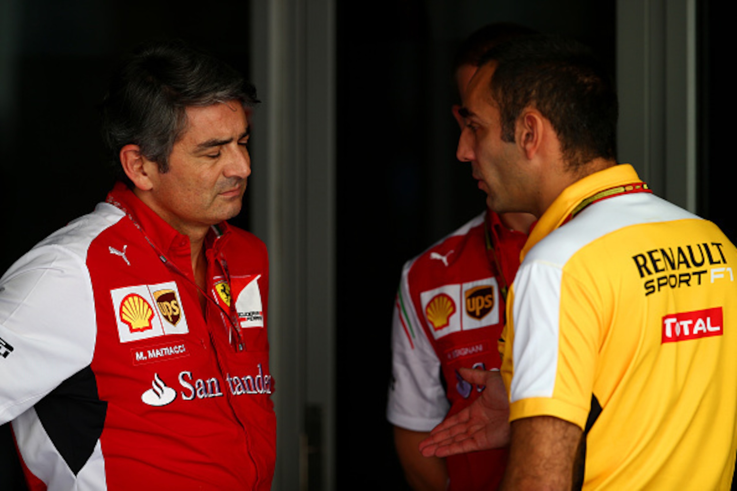 ABU DHABI, UNITED ARAB EMIRATES - NOVEMBER 22:  Ferrari Team Principal Marco Mattiacci speaks with Renault's Cyril Abiteboul in the paddock before final practice ahead of the Abu Dhabi Formula One Grand Prix at Yas Marina Circuit on November 22, 2014 in A