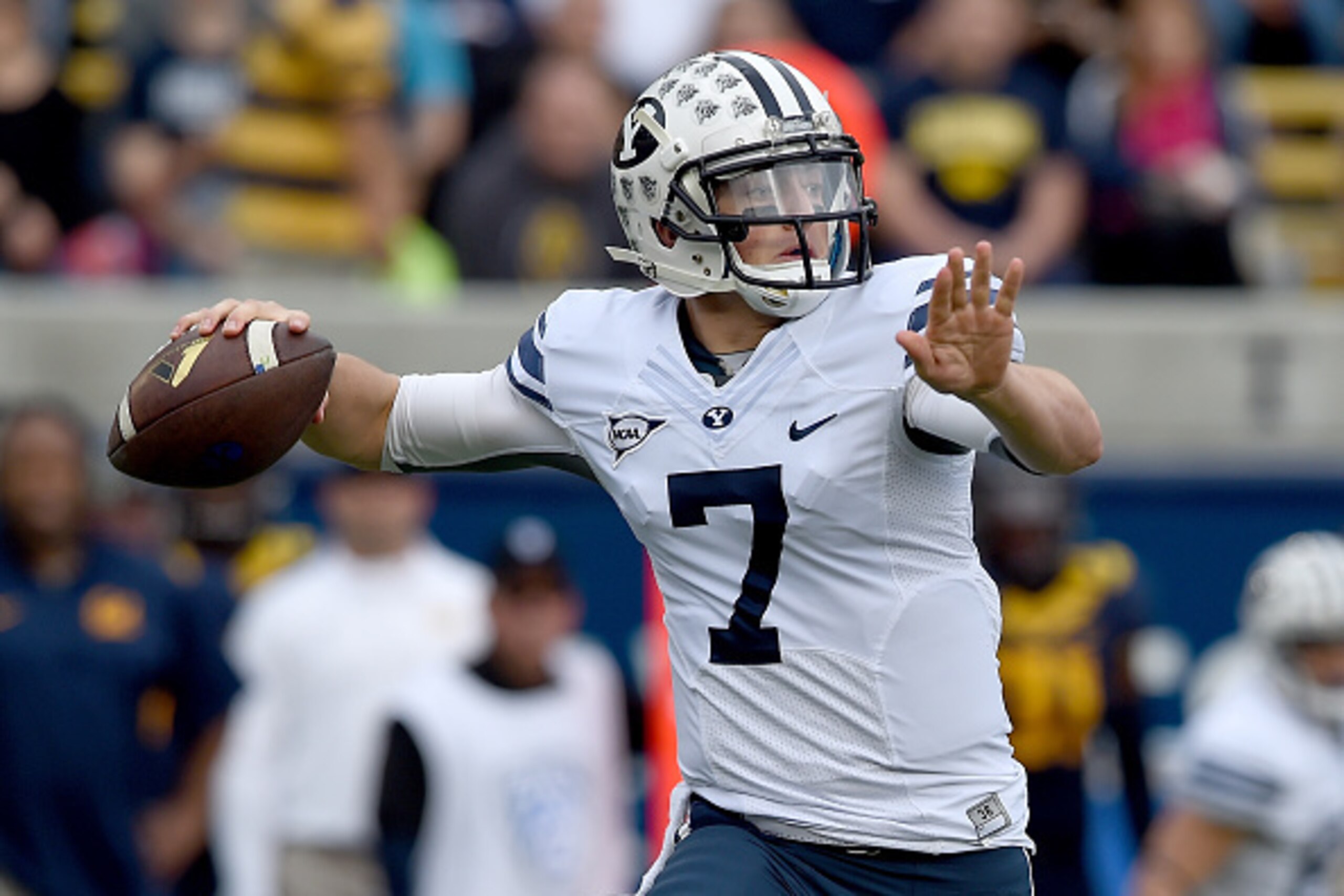 BERKELEY, CA - NOVEMBER 29:  Christian Stewart #7 of the Brigham Young Cougars looks to pass against the California Golden Bears during the first quarter at California Memorial Stadium on November 29, 2014 in Berkeley, California.  (Photo by Thearon W. He