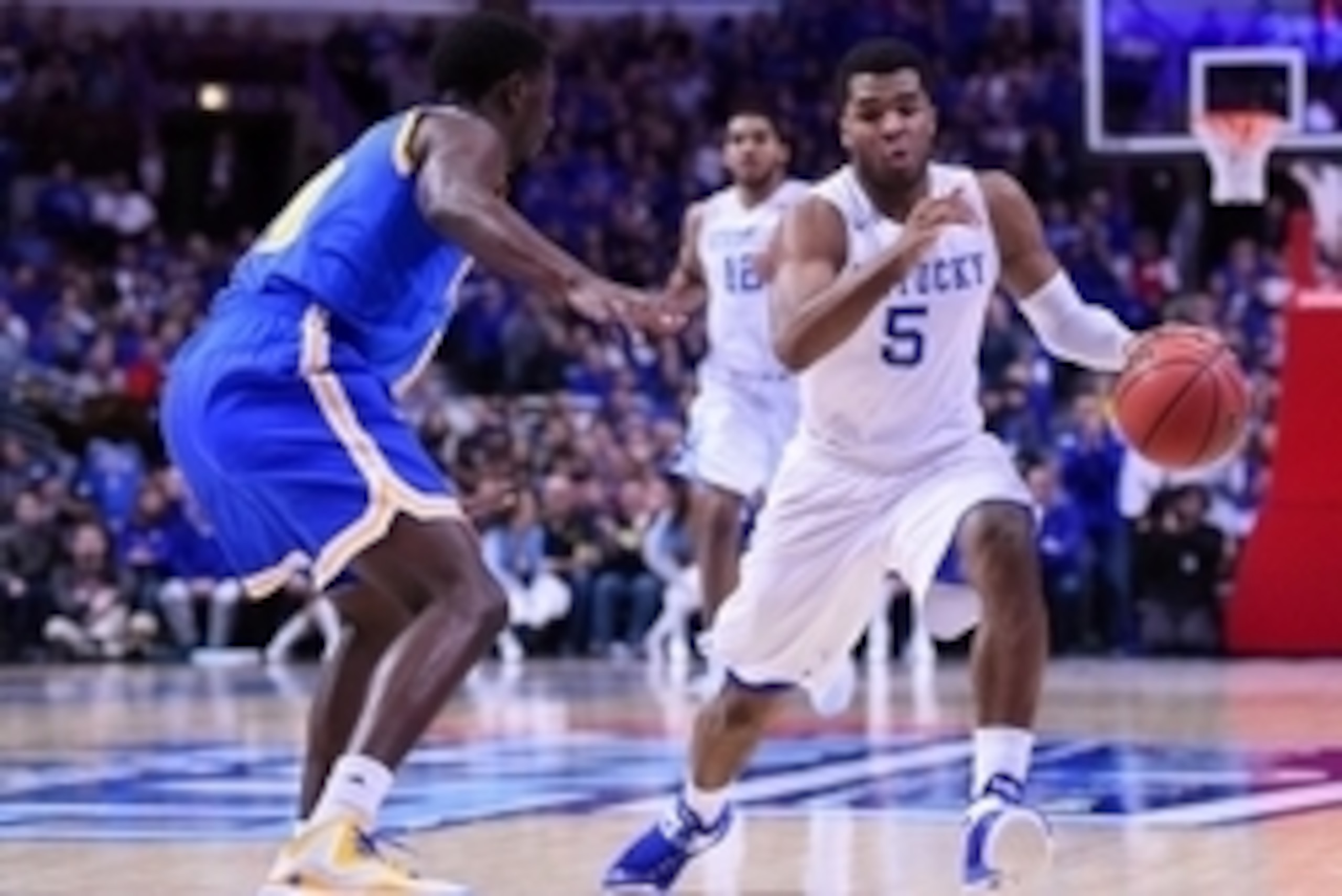 Dec 20, 2014; Chicago, IL, USA; Kentucky Wildcats guard Andrew Harrison (5) dribbles the ball against the UCLA Bruins during the first half at United Center. Mandatory Credit: Mike DiNovo-USA TODAY Sports