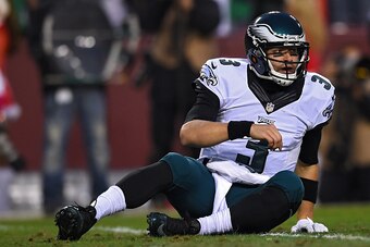 LANDOVER, MD - DECEMBER 20: Quarterback Mark Sanchez #3 of the Philadelphia Eagles looks on after taking a hit in the first half against the Washington Redskins at FedExField on December 20, 2014 in Landover, Maryland. The Washington Redskins won, 27-24. 