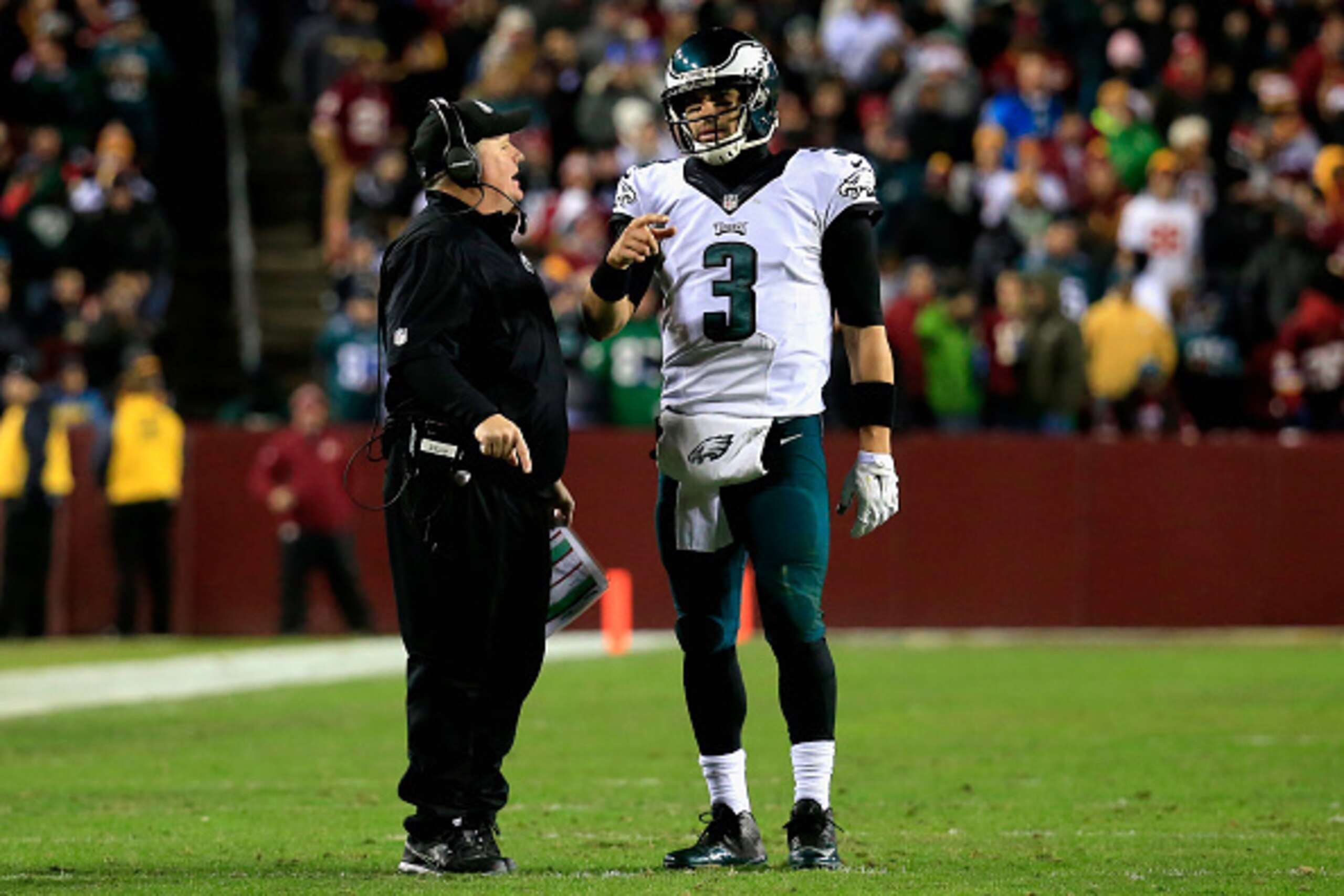 LANDOVER, MD - DECEMBER 20: Head coach Chip Kelly of the Philadelphia Eagles and quarterback Mark Sanchez #3 of the Philadelphia Eagles talk in the second quarter of a game against the Washington Redskins at FedExField on December 20, 2014 in Landover, Ma LANDOVER, MD - DECEMBER 20: Head coach Chip Kelly of the Philadelphia Eagles and quarterback Mark Sanchez #3 of the Philadelphia Eagles talk in the second quarter of a game against the Washington Redskins at FedExField on December 20, 2014 in Landover, Ma