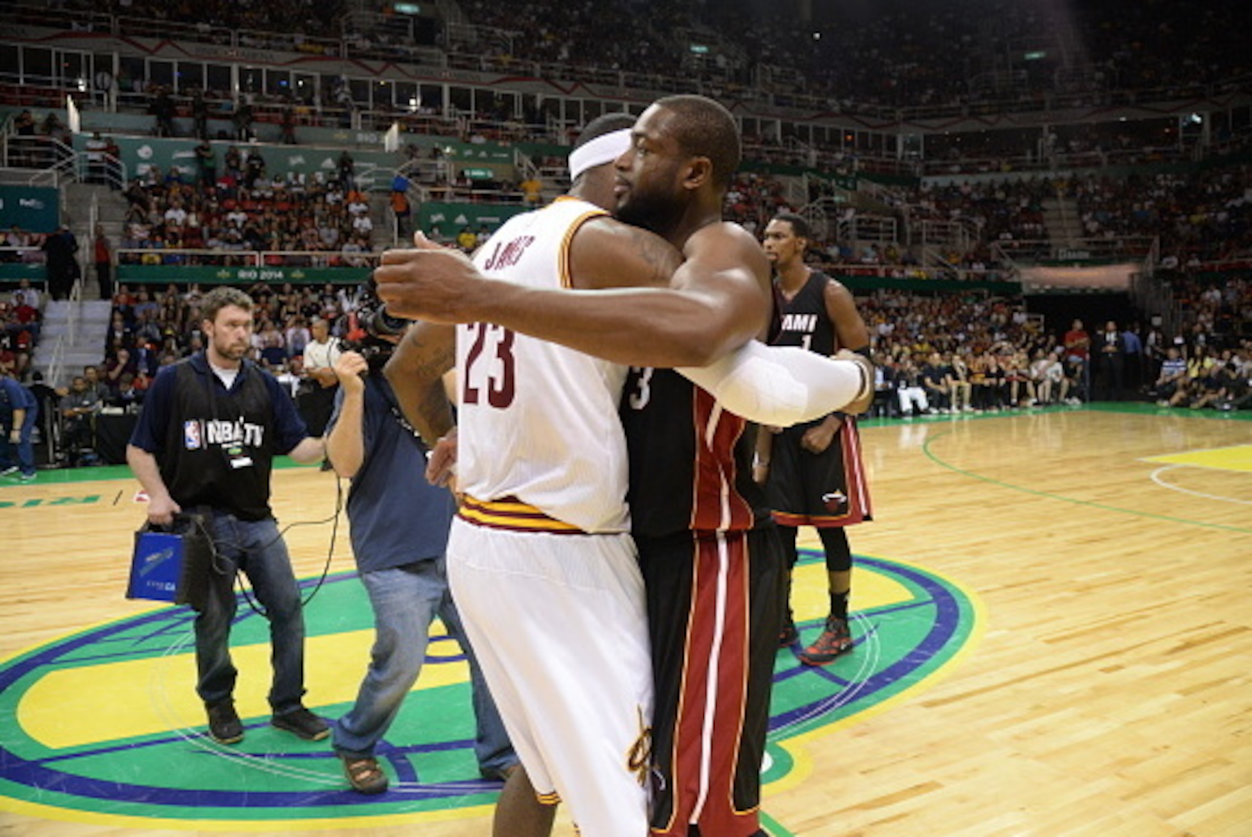 RIO DE JANEIRO, BRAZIL - OCTOBER 11:  LeBron James #23 of the Cleveland Cavaliers and Dwyane Wade #3 of the Miami Heat hug after a game at the HSBC Arena as a part of NBA Global Games on October 11, 2014 in Rio de Janeiro, Brazil.  NOTE TO USER:  User exp