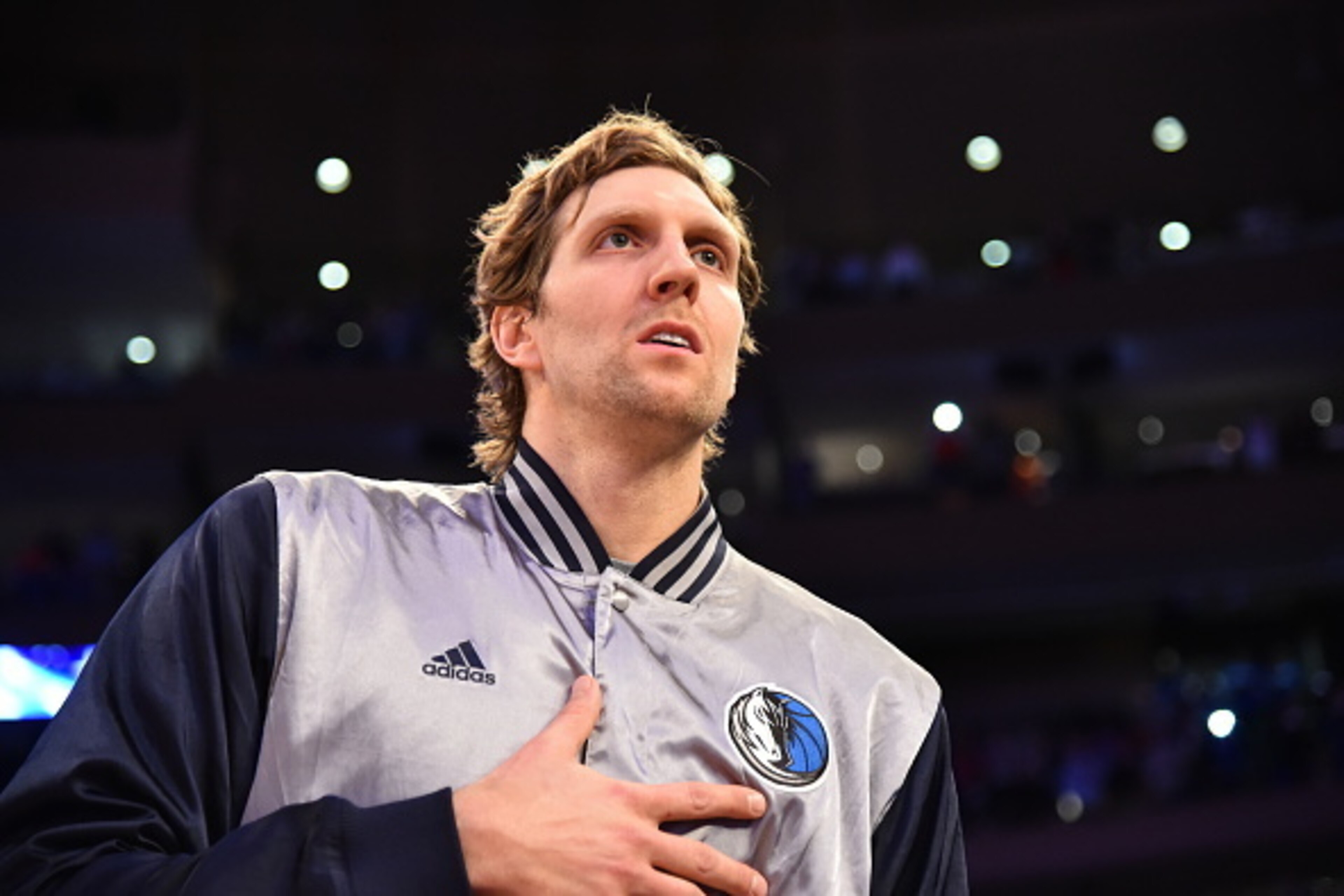 NEW YORK, NY - DECEMBER 16: Dirk Nowitzki #41 of the Dallas Mavericks listens to the National Anthem prior to the game against the New York Knicks on December 16, 2014 at Madison Square Garden in New York, NY. NOTE TO USER: User expressly acknowledges and