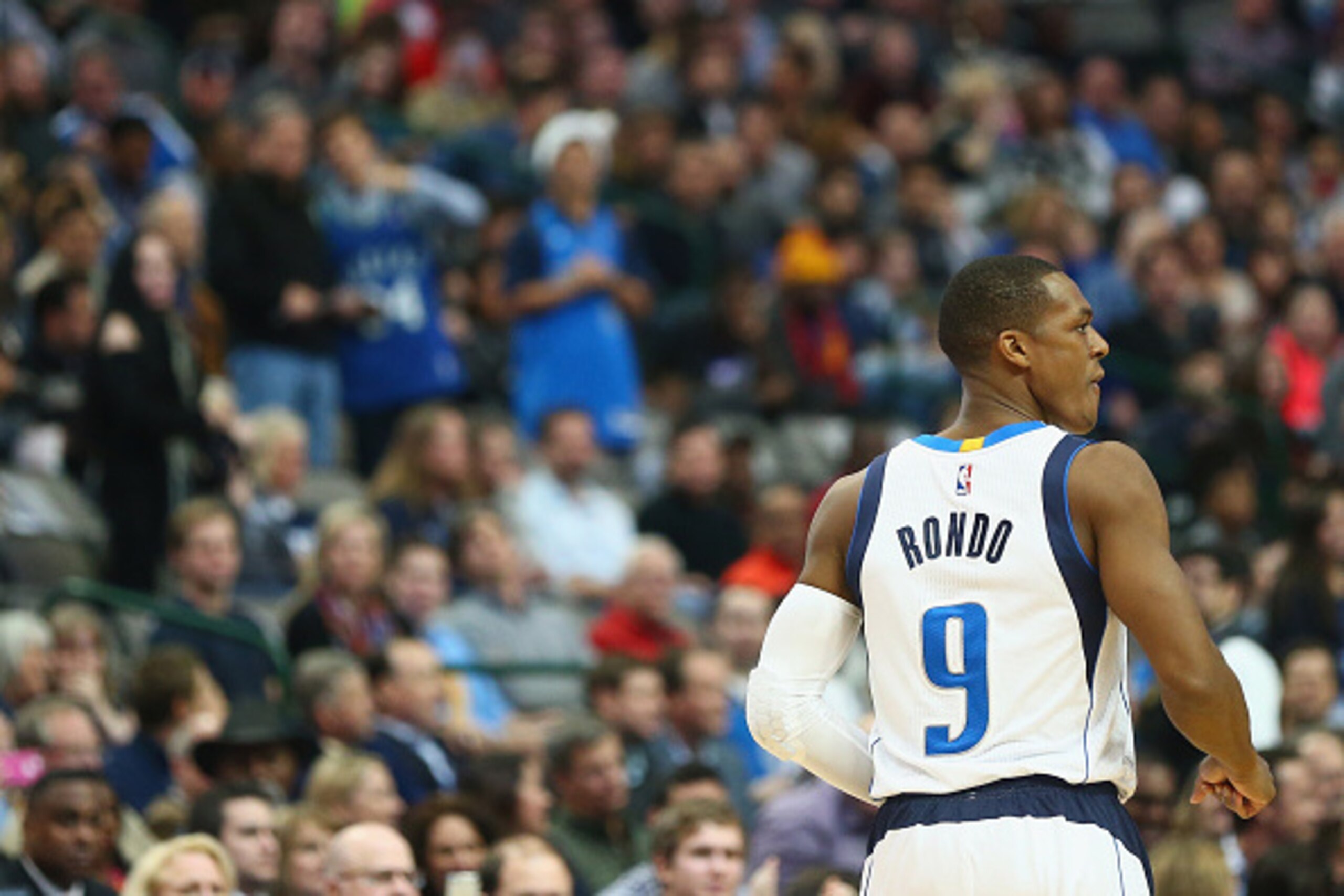 DALLAS, TX - DECEMBER 20:  Rajon Rondo #9 of the Dallas Mavericks walks on the court prior to the start of play agains the San Antonio Spurs at American Airlines Center on December 20, 2014 in Dallas, Texas.  (Photo by Ronald Martinez/Getty Images)