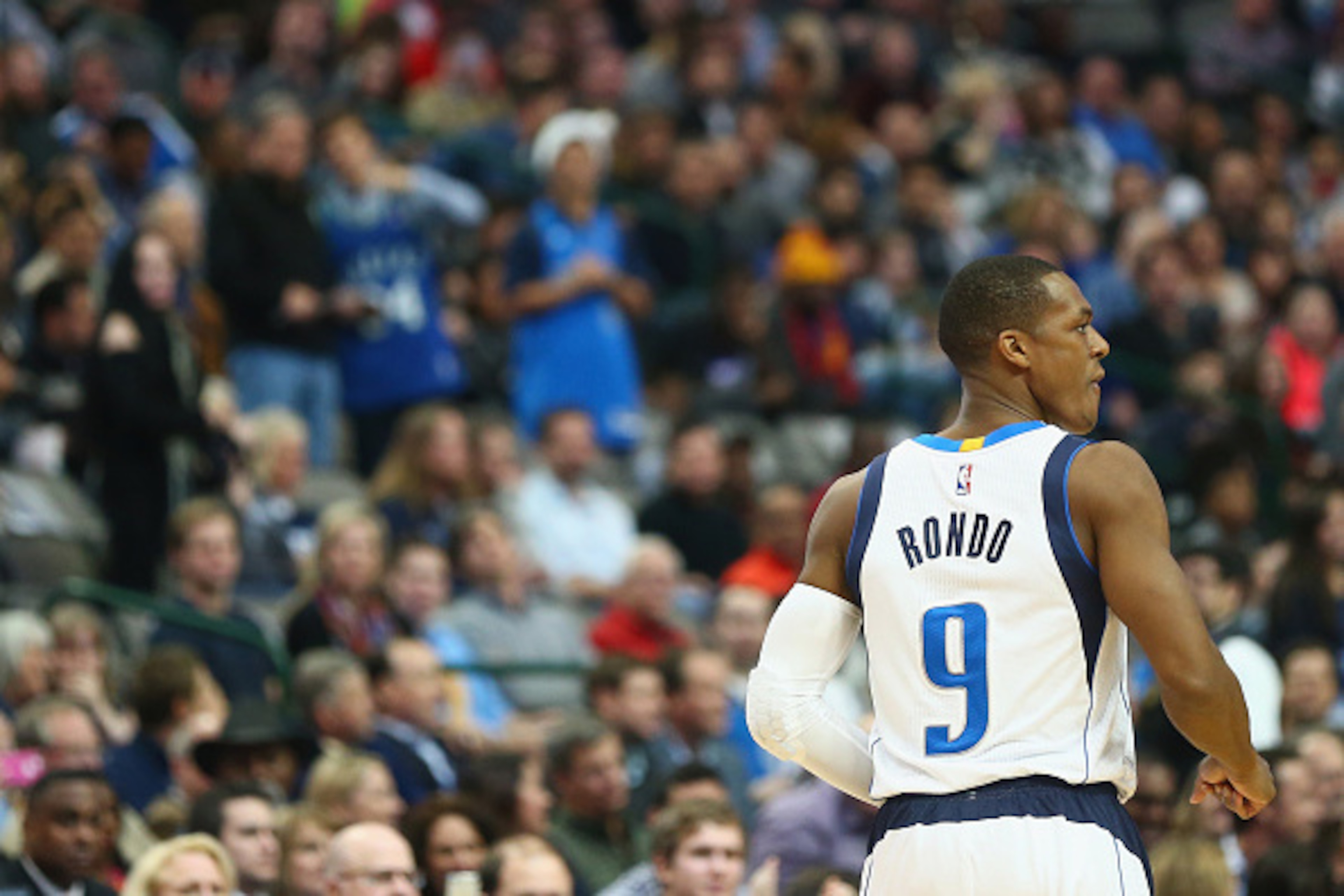 DALLAS, TX - DECEMBER 20:  Rajon Rondo #9 of the Dallas Mavericks walks on the court prior to the start of play agains the San Antonio Spurs at American Airlines Center on December 20, 2014 in Dallas, Texas.  (Photo by Ronald Martinez/Getty Images)