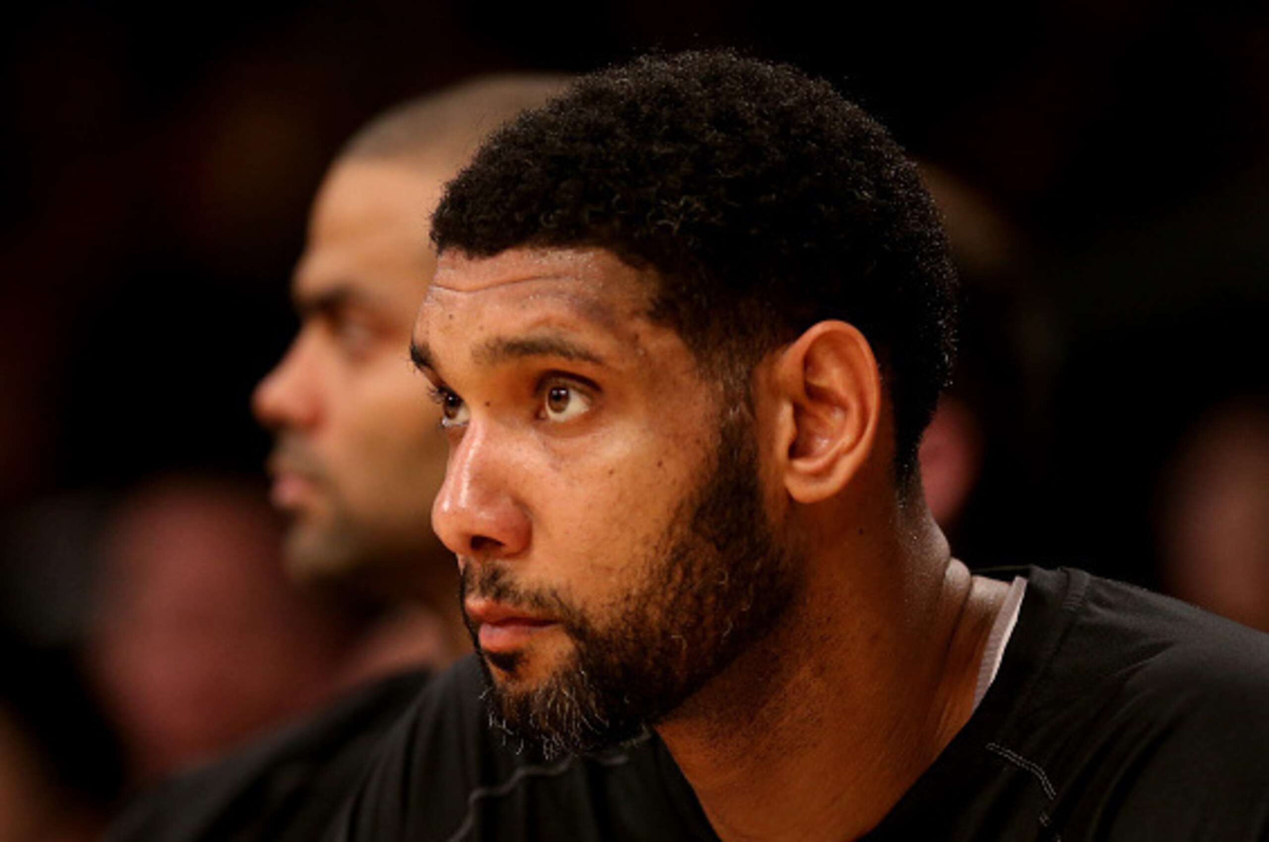 LOS ANGELES, CA - NOVEMBER 14: Tim Duncan #21 (R) and tony Parker #9 of the San Antonio Spurs sit on the Spurs bench in the game with the Los Angeles Lakers at Staples Center on November 14, 2014 in Los Angeles, California.  NOTE TO USER: User expressly a