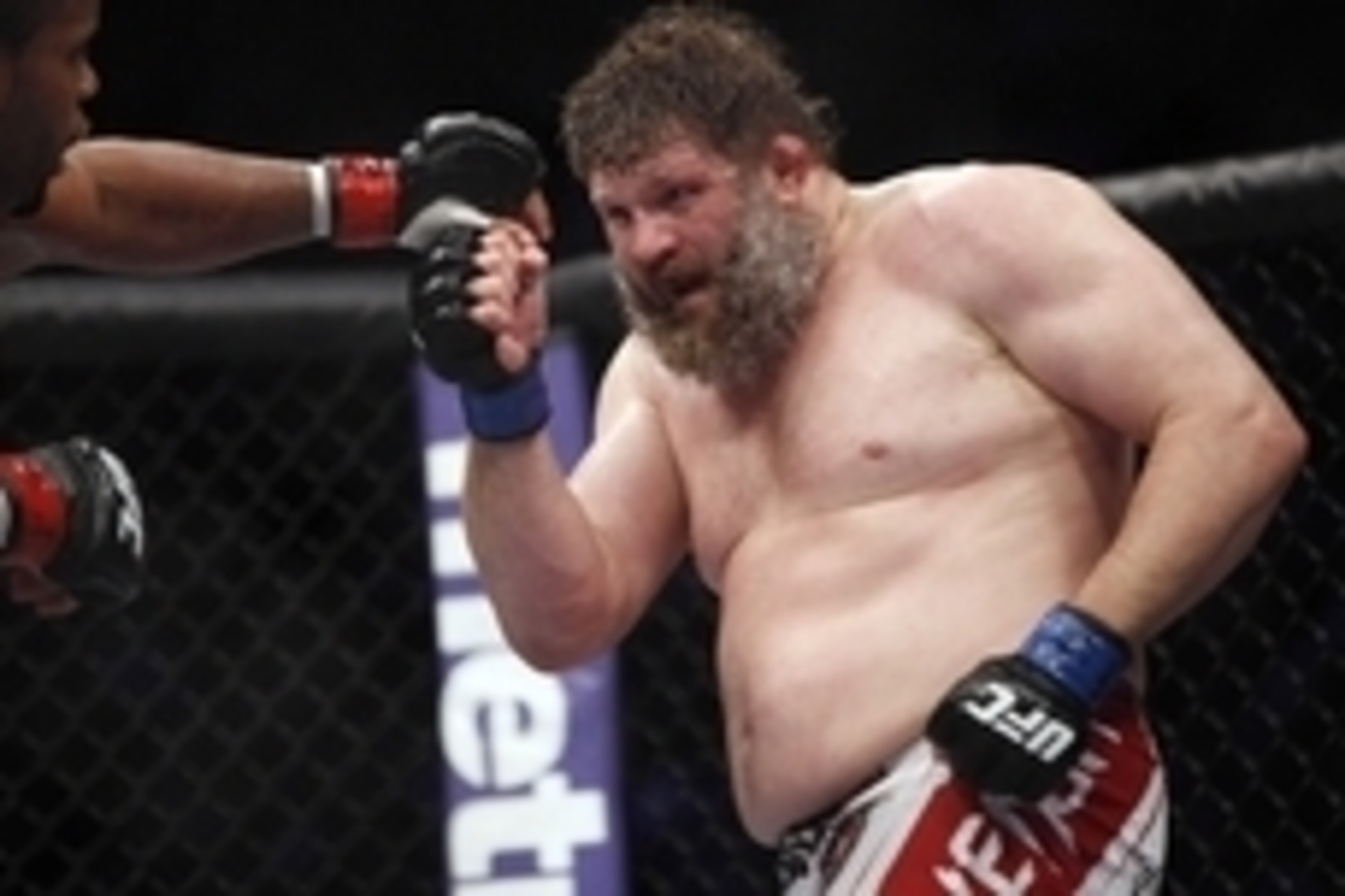 Oct 19, 2013; Houston, TX, USA; Daniel Cormier (red gloves) fights against Roy Nelson (blue gloves) in their heavyweight bout during UFC 166 at Toyota Center. Mandatory Credit: Andrew Richardson-USA TODAY Sports