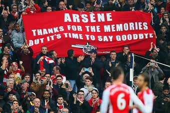 WEST BROMWICH, ENGLAND - NOVEMBER 29:   (EDITORS NOTE: This is a retransmission of image #459708260 with an alternative crop)   Arsenal fans hold up a banner for Arsene Wenger, manager of Arsenal during the Barclays Premier League match between West Bromw