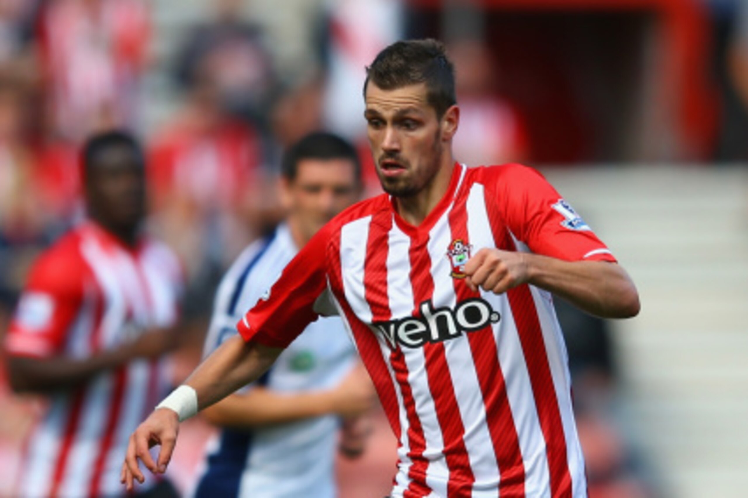 SOUTHAMPTON, ENGLAND - AUGUST 23:  Morgan Schneiderlin of Southampton on the ball during the Barclays Premier League match between Southampton and West Bromwich Albion at St Mary's Stadium on August 23, 2014 in Southampton, England.  (Photo by Richard Hea