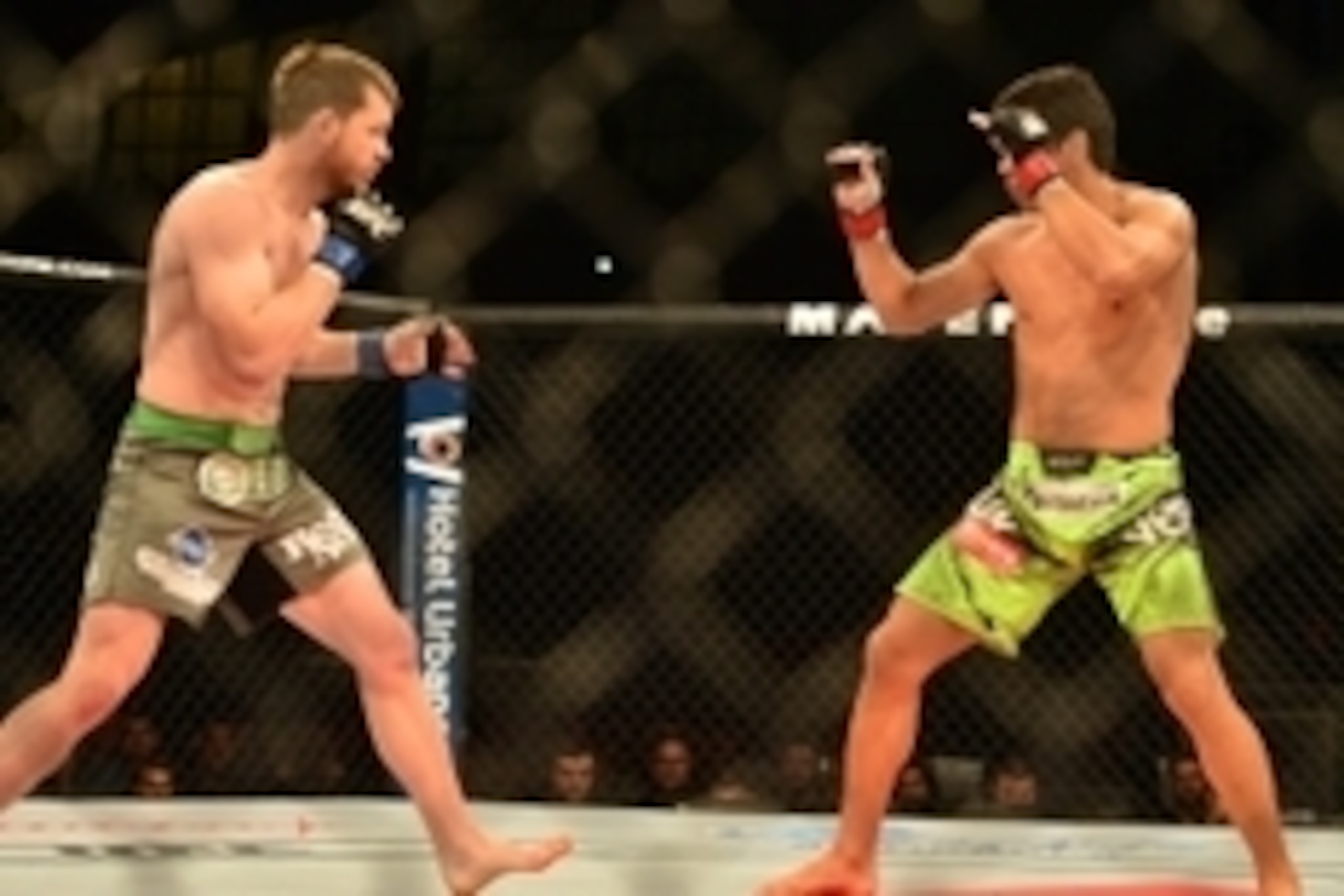 Dec 20, 2014; Barueri, SP, Brazil; Lyoto Machida (red gloves) fights against C.B. Dollaway (blue gloves) during UFC Fight Night at Jose Correa Arena. Mandatory Credit: Jason Silva-USA TODAY Sports