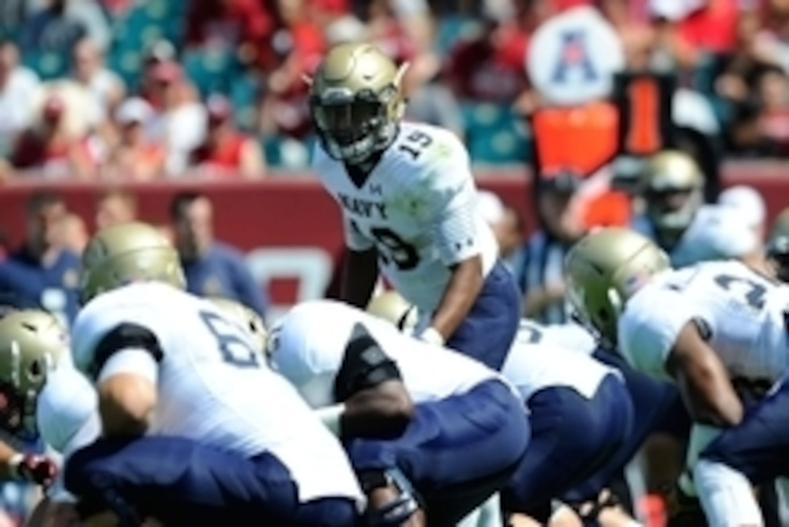 Sep 6, 2014; Philadelphia, PA, USA; Navy Midshipmen quarterback Keenan Reynolds (19) calls a play at the line against the Temple Owls during the first quarter at Lincoln Financial Field.  Mandatory Credit: Rich Barnes-USA TODAY Sports