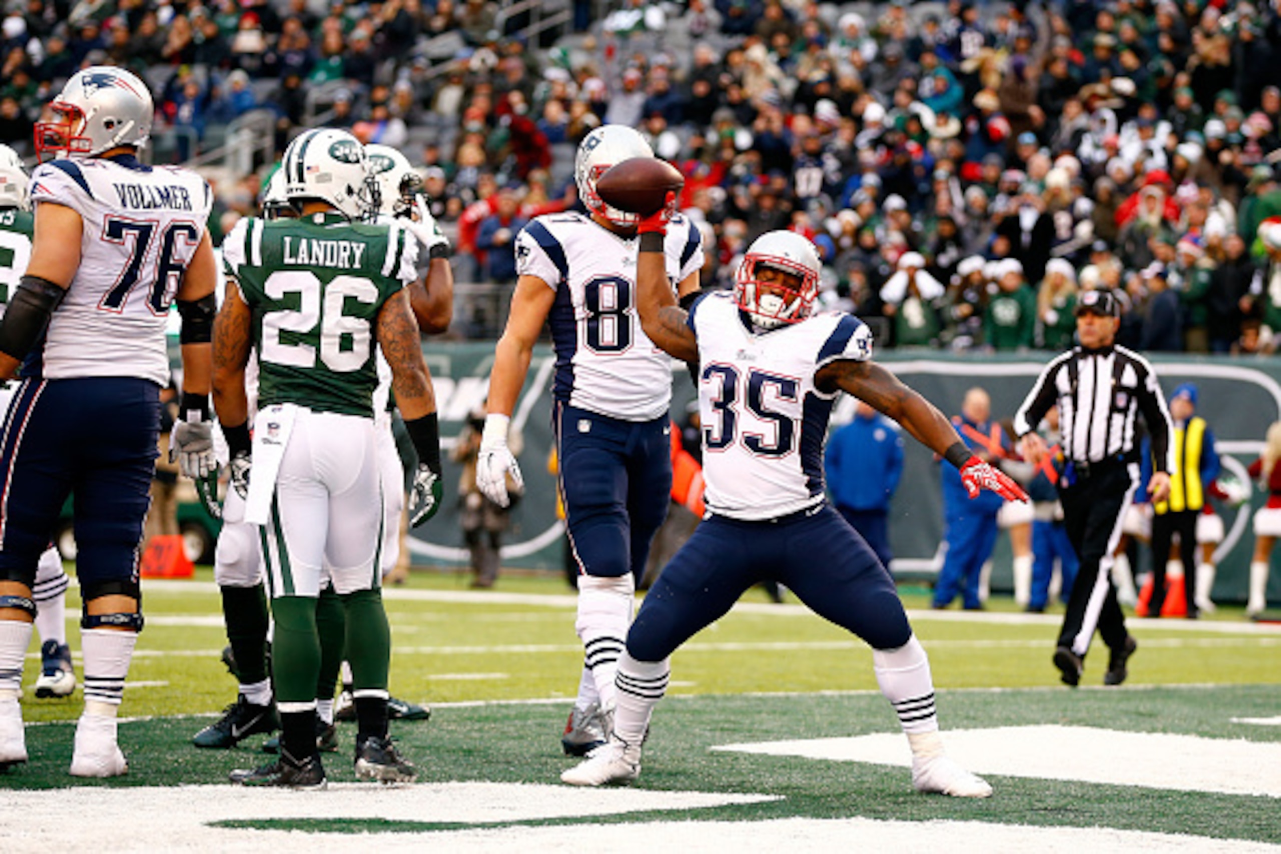 EAST RUTHERFORD, NJ - DECEMBER 21:  Running back Jonas Gray #35 of the New England Patriots spikes the ball after scoring a touchdown in the fourth quarter against the New York Jets during a game at MetLife Stadium on December 21, 2014 in East Rutherford,