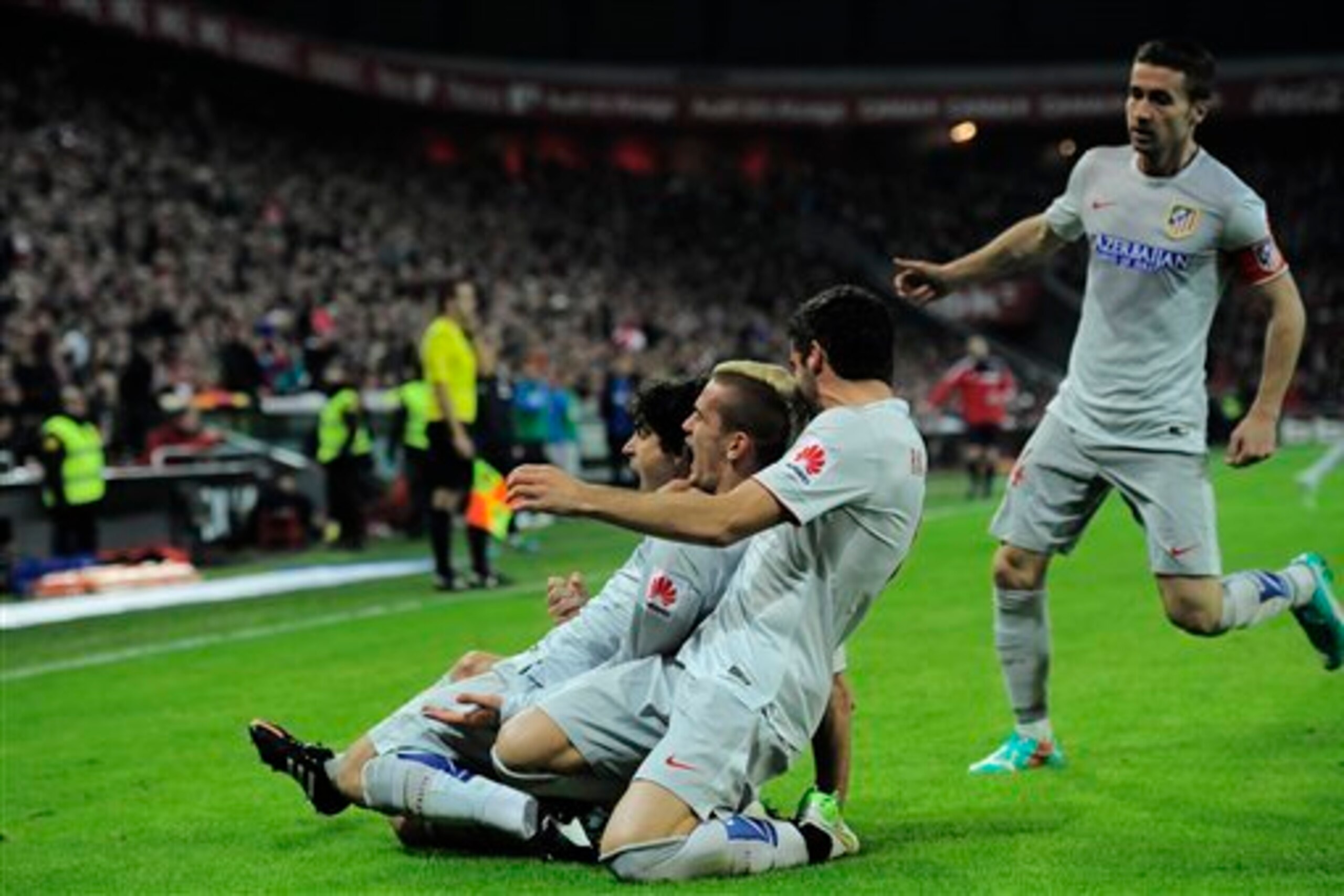 Atletico celebrate a goal.